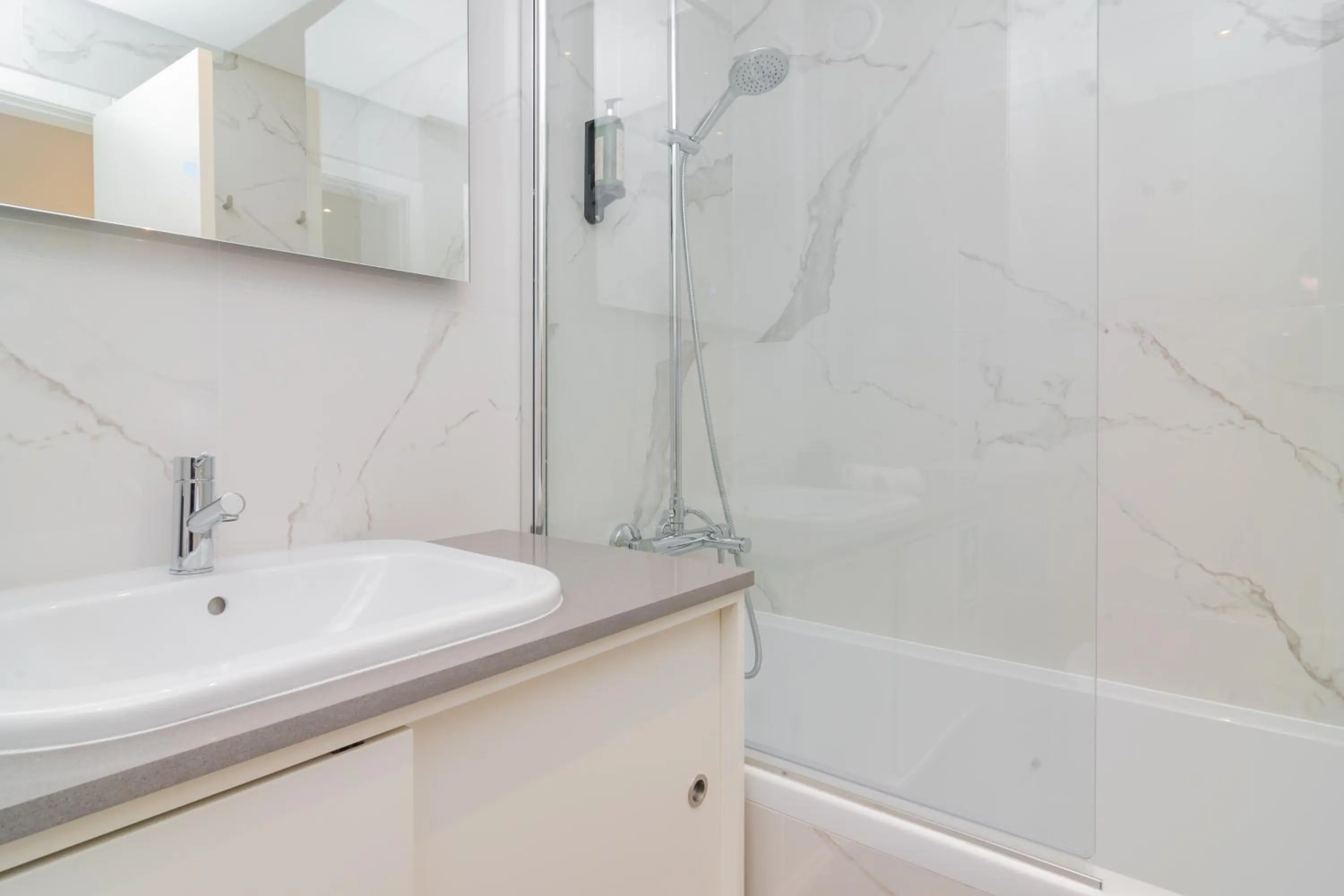 Bathroom in Coastal Charm by LovelyStay