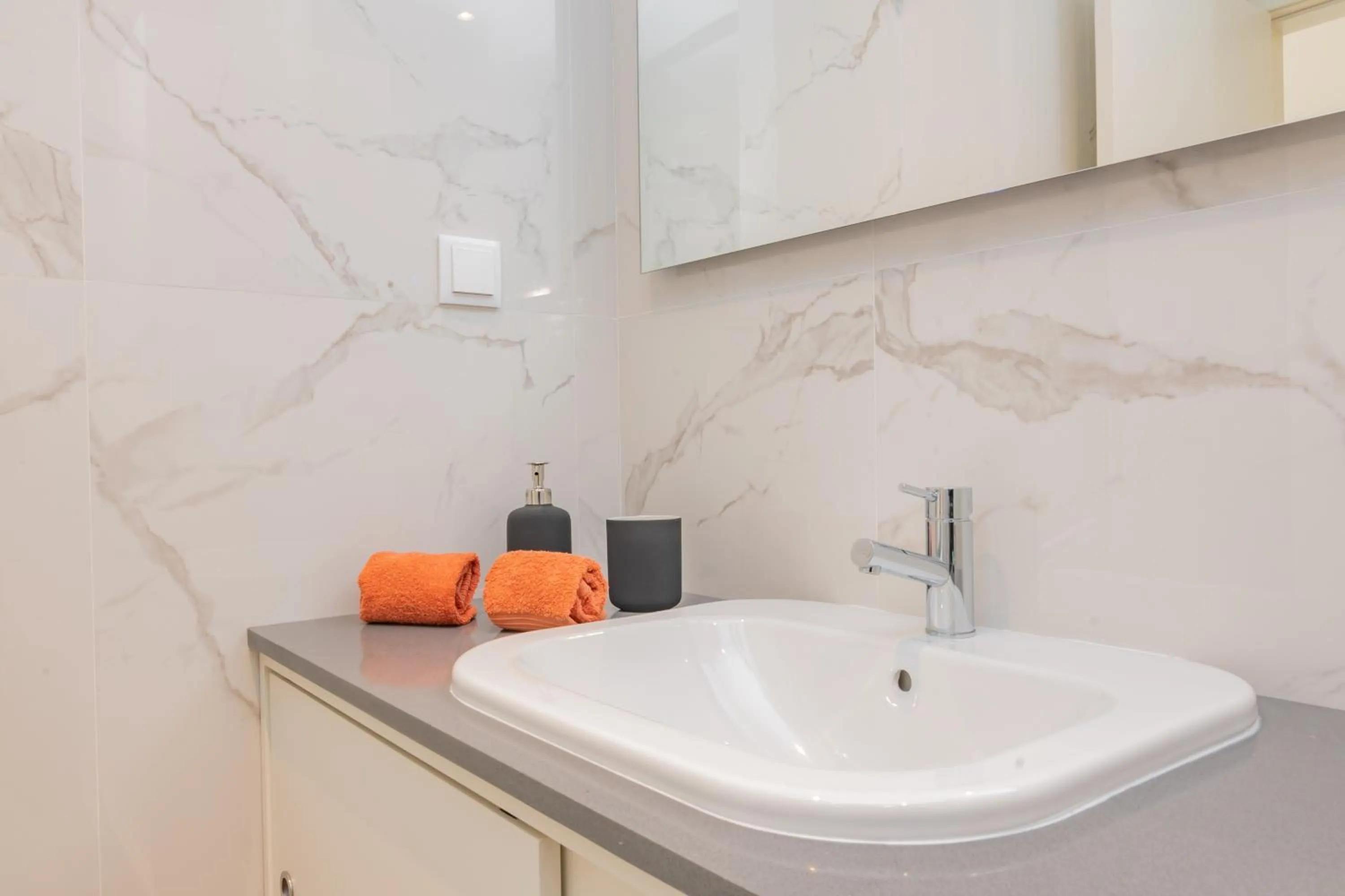 Bathroom in Coastal Charm by LovelyStay