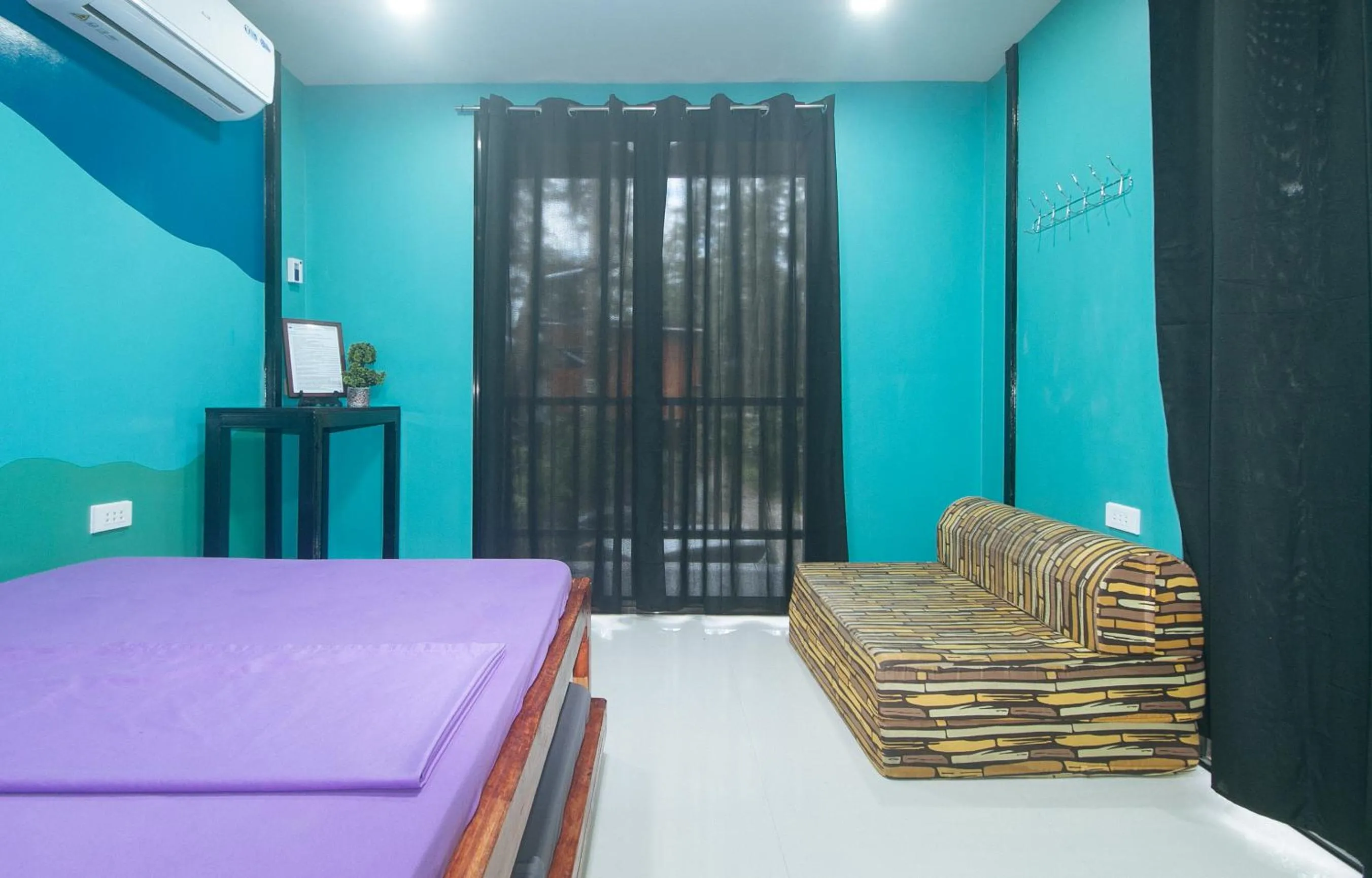 Bed in RedDoorz @ Dolce Cabanas Beach Resort