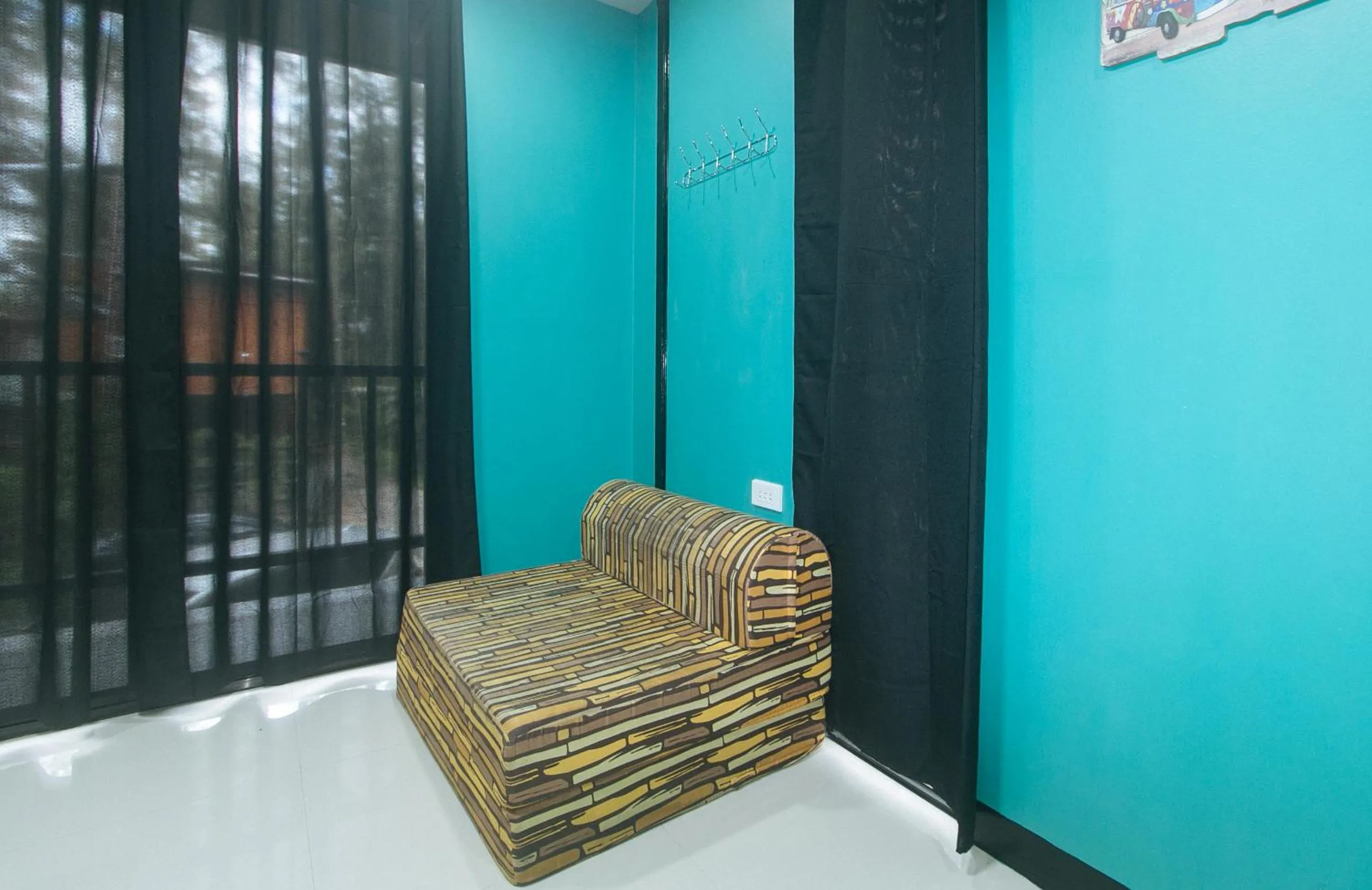 Seating area in RedDoorz @ Dolce Cabanas Beach Resort