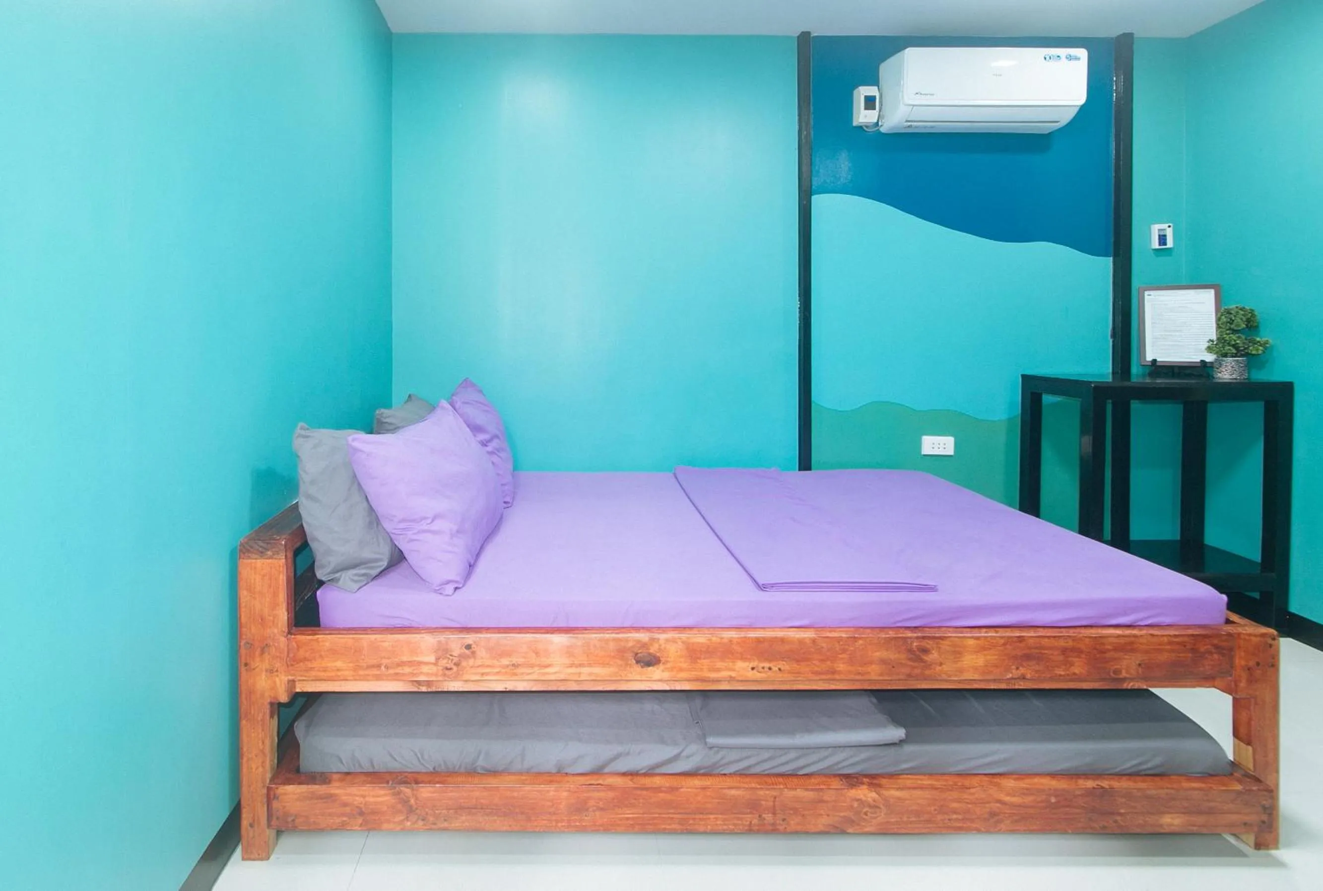 Photo of the whole room, Bed in RedDoorz @ Dolce Cabanas Beach Resort