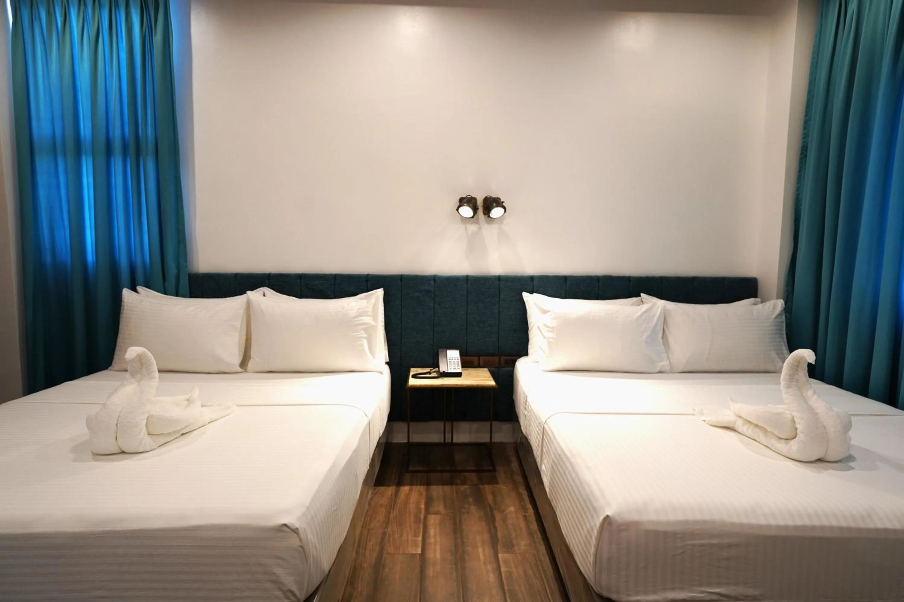 Bed in Lighthouse Point Hotel