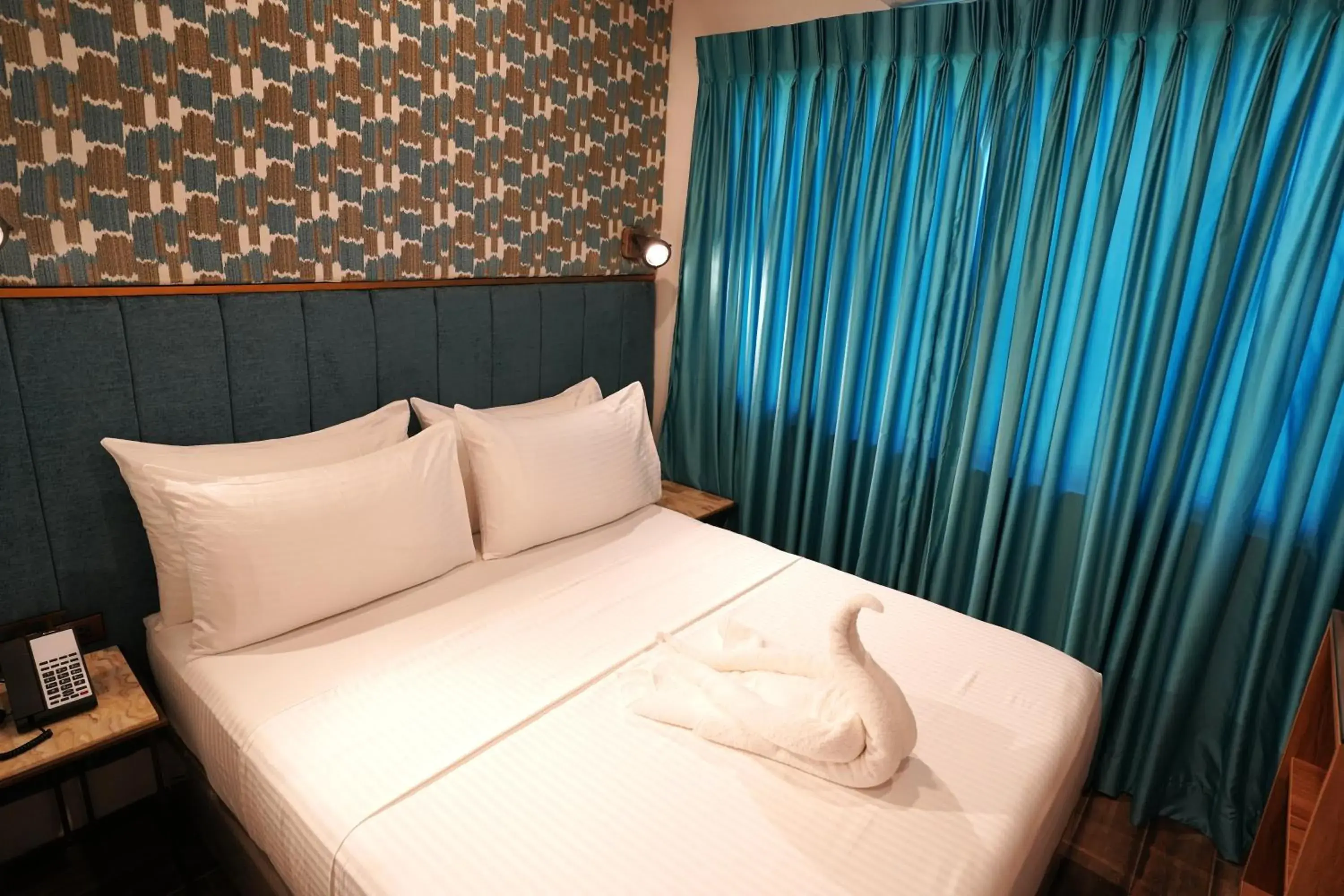 Bed in Lighthouse Point Hotel Bed in Lighthouse Point Hotel