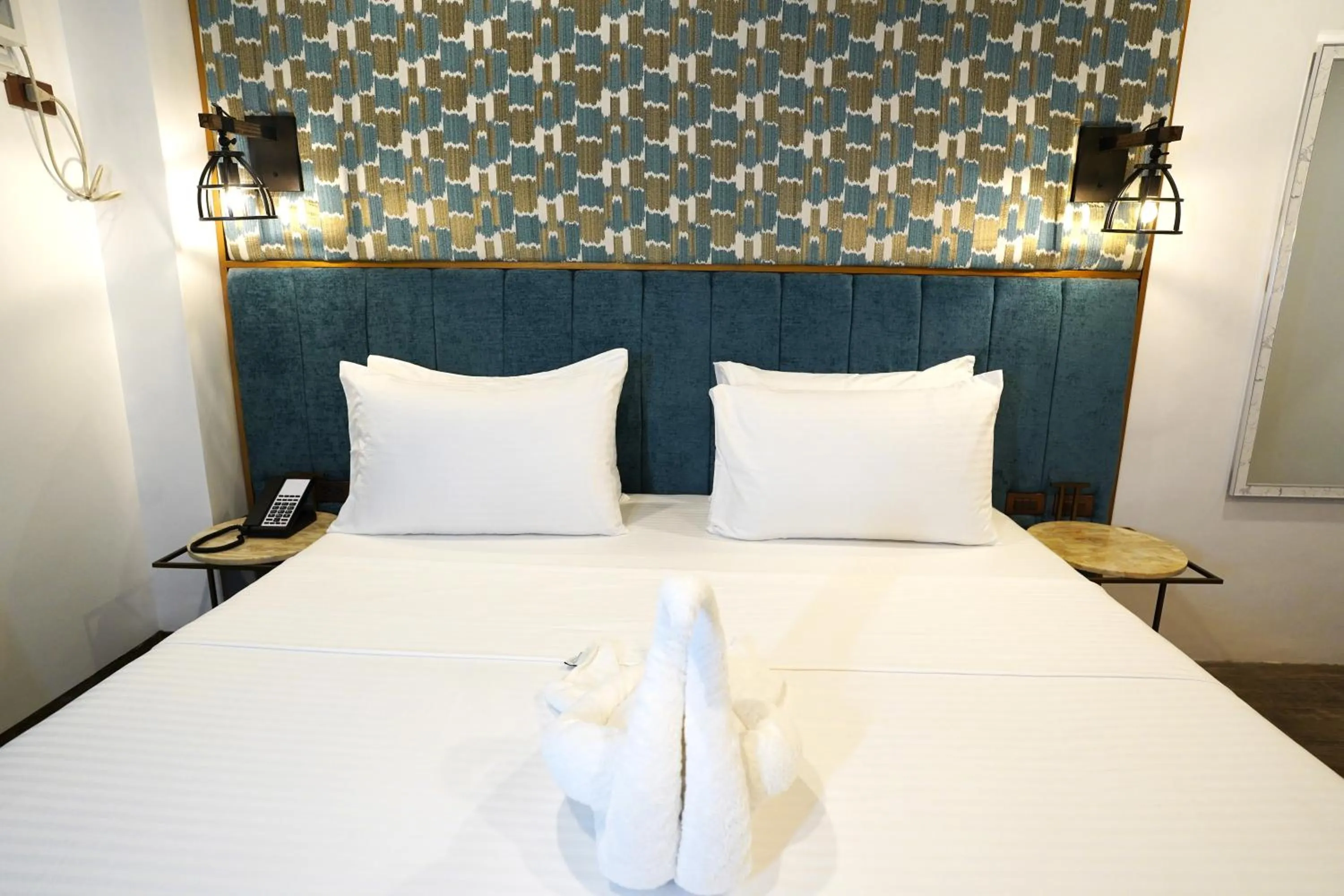 Bed in Lighthouse Point Hotel