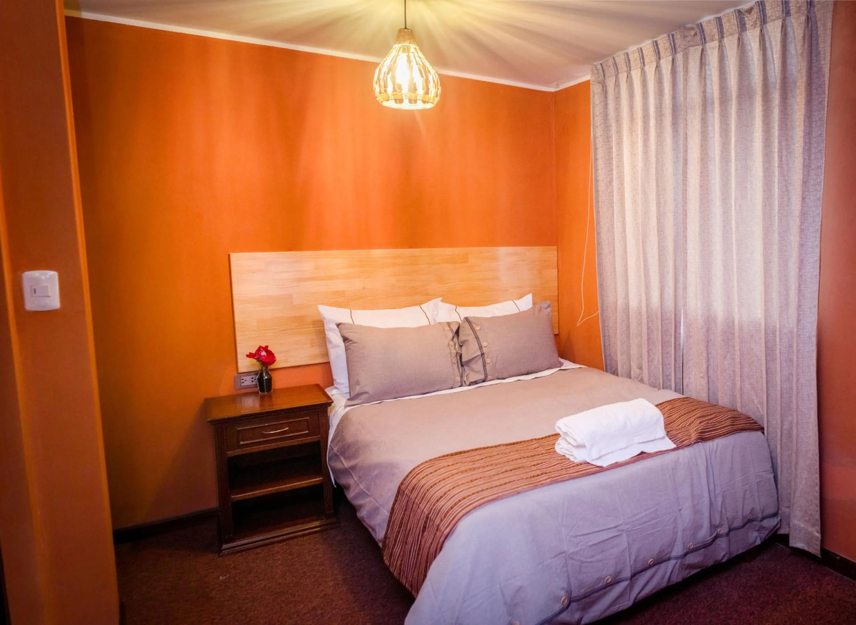 Bed in Colibrí Inn