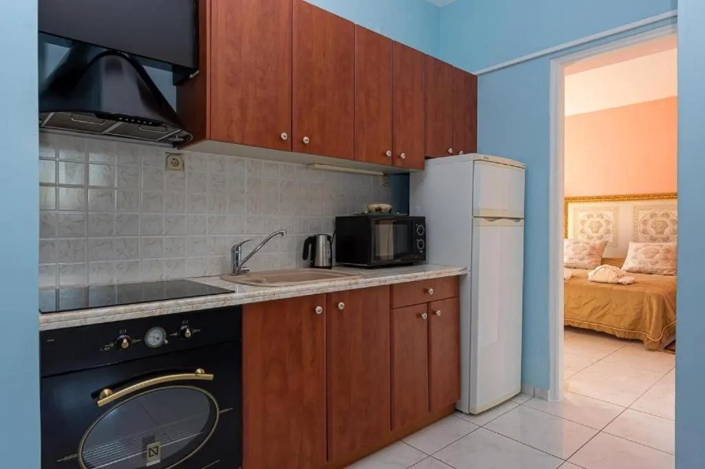 Kitchen or kitchenette in Rafkos Mansion with Private Pool and Amazing View