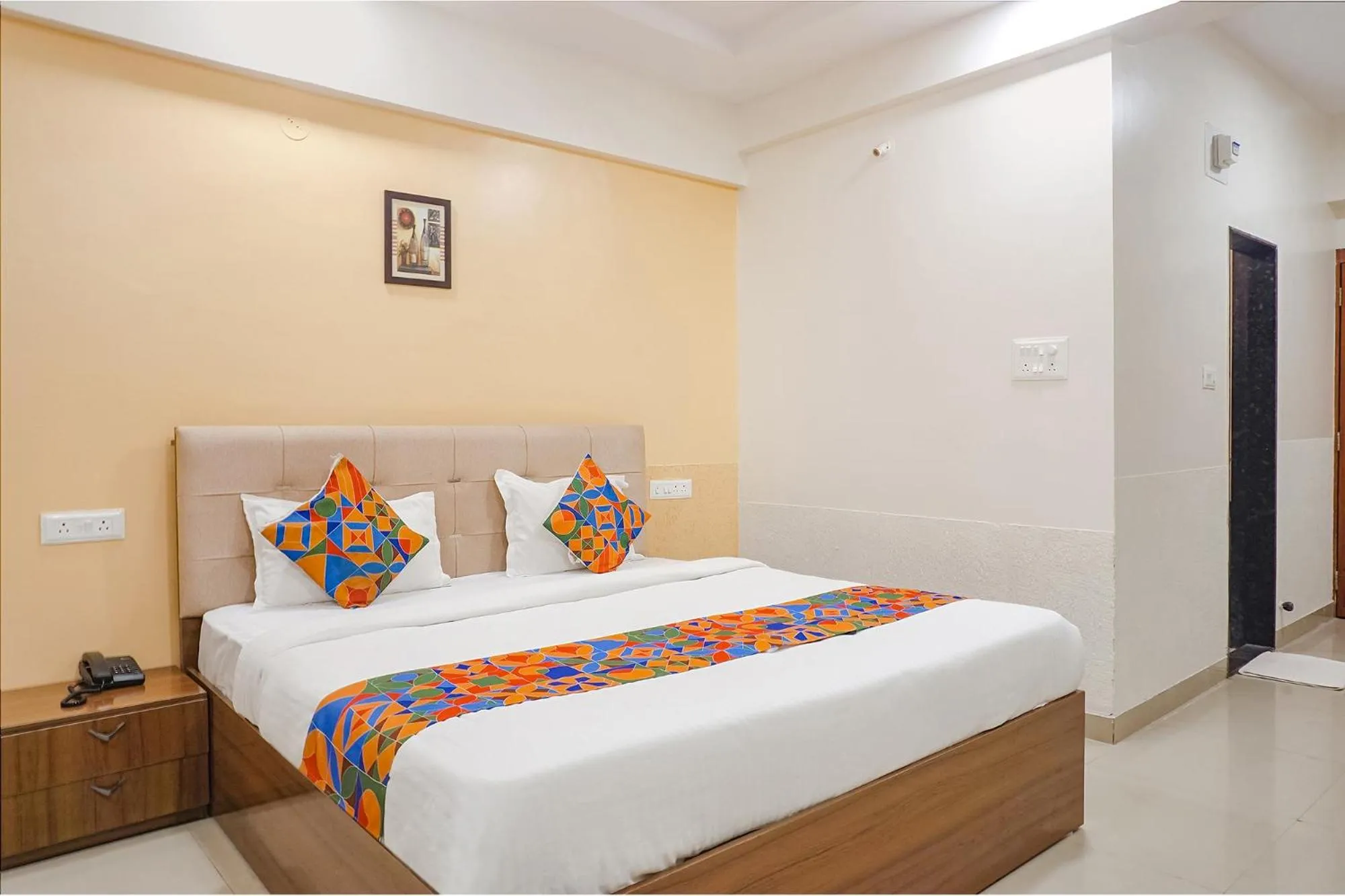 Bed in FabHotel Embassy near Amanora Mall