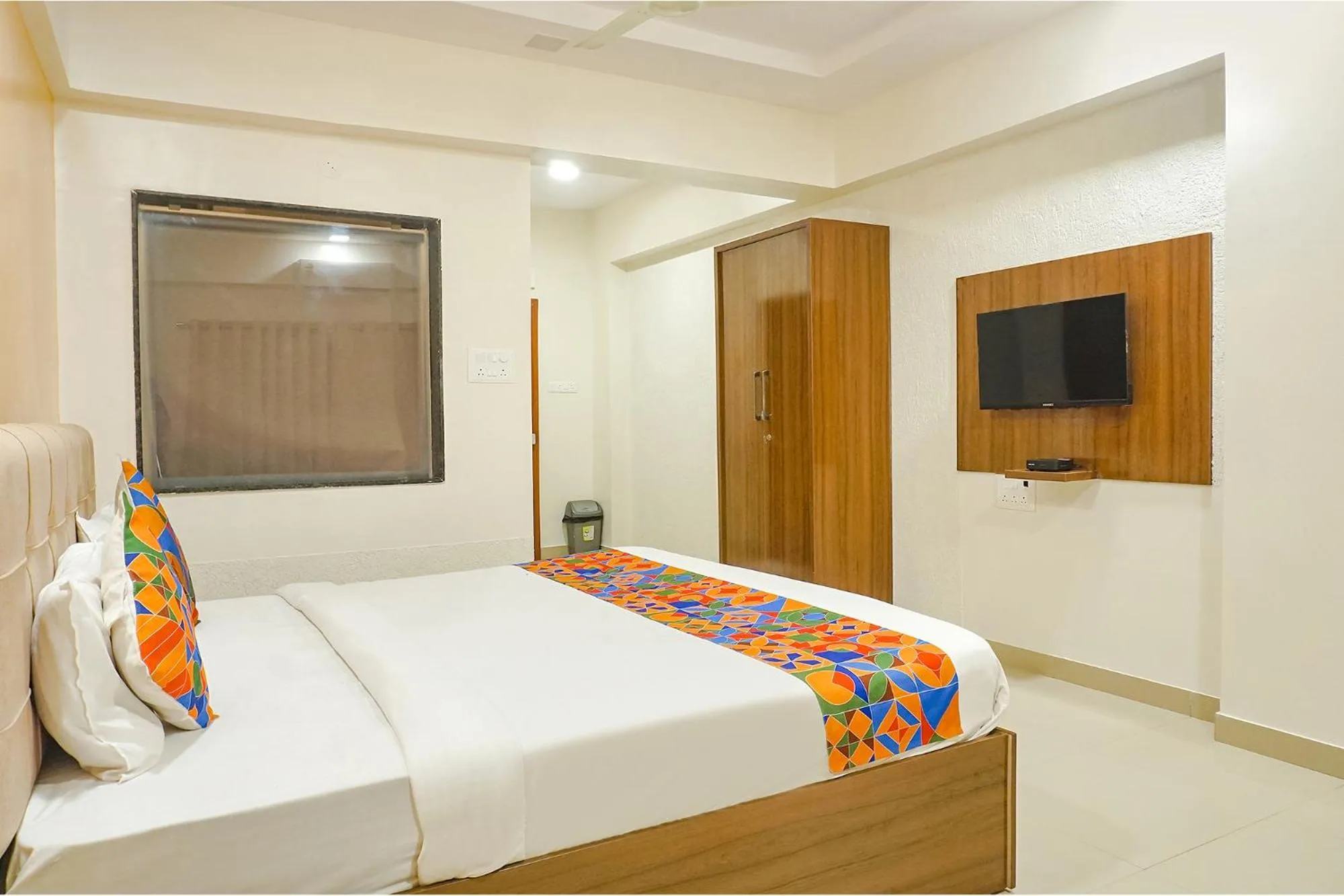 Bed in FabHotel Embassy near Amanora Mall
