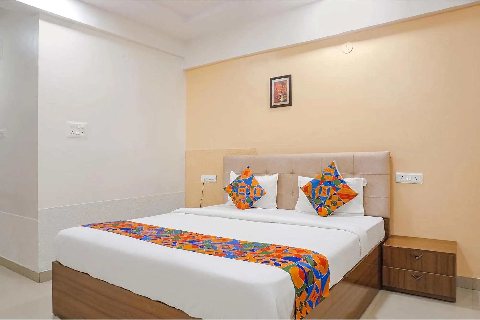 Bed in FabHotel Embassy near Amanora Mall