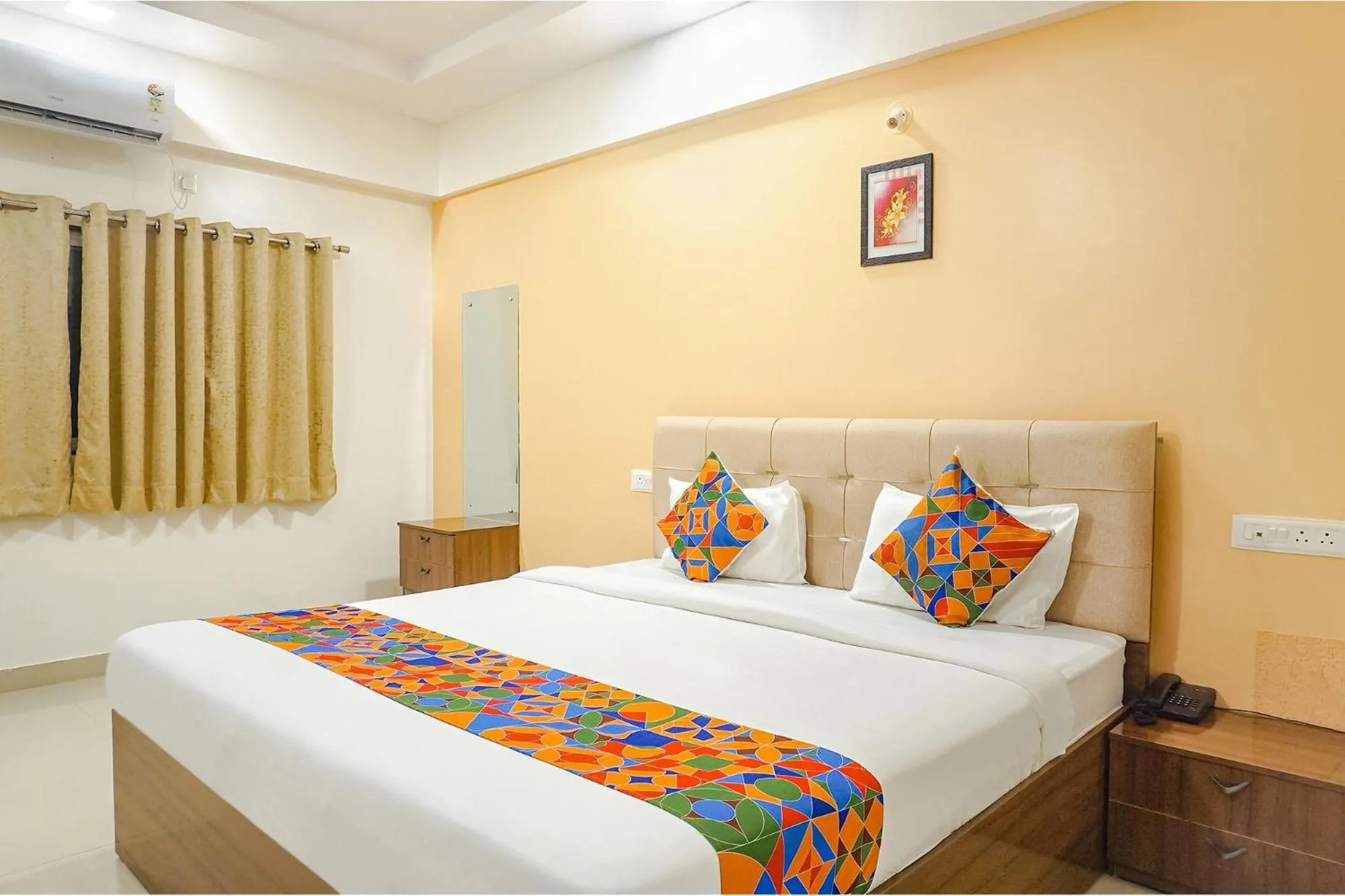 Bed in FabHotel Embassy near Amanora Mall