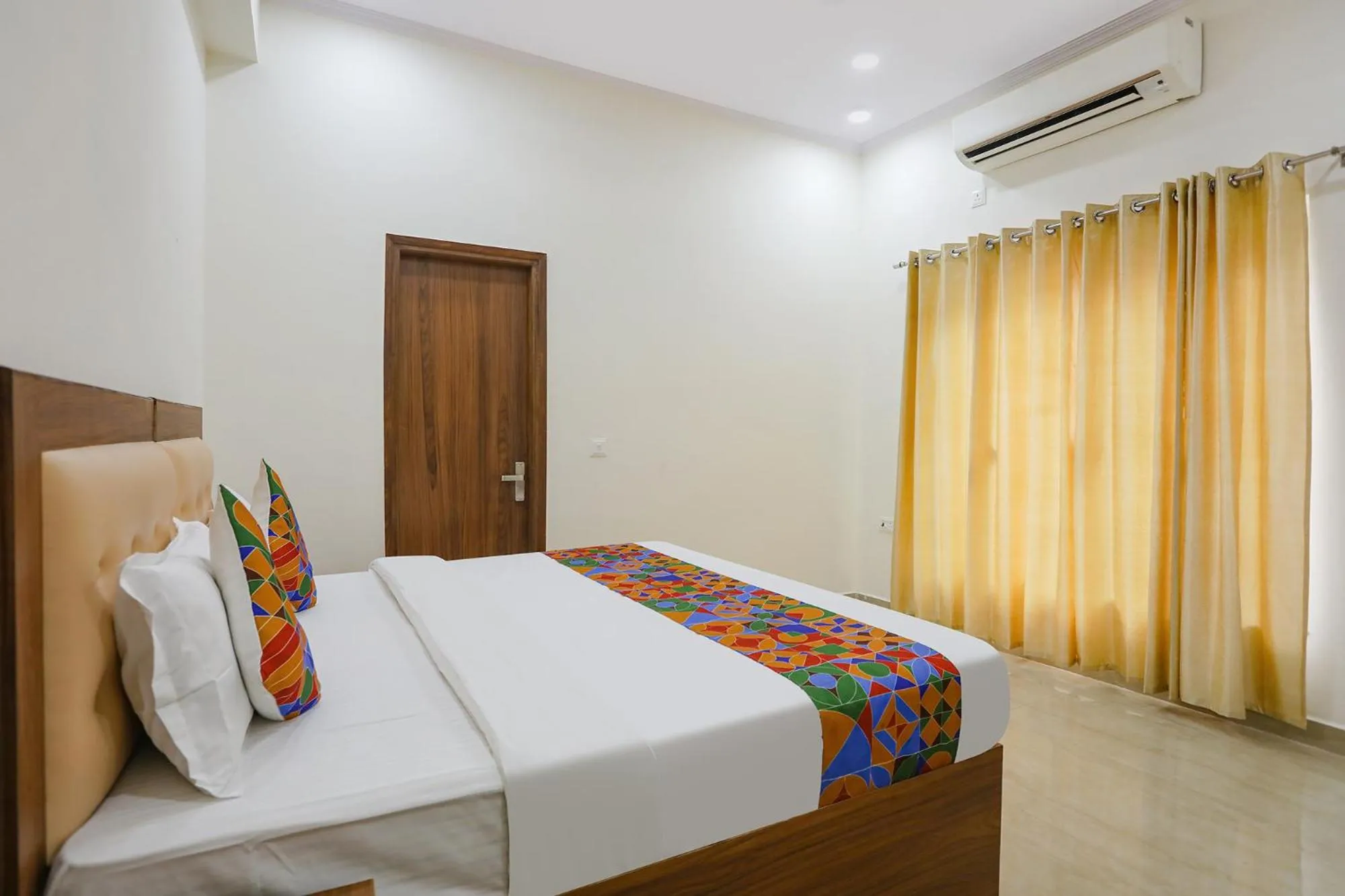 Bed in FabHotel Grihum