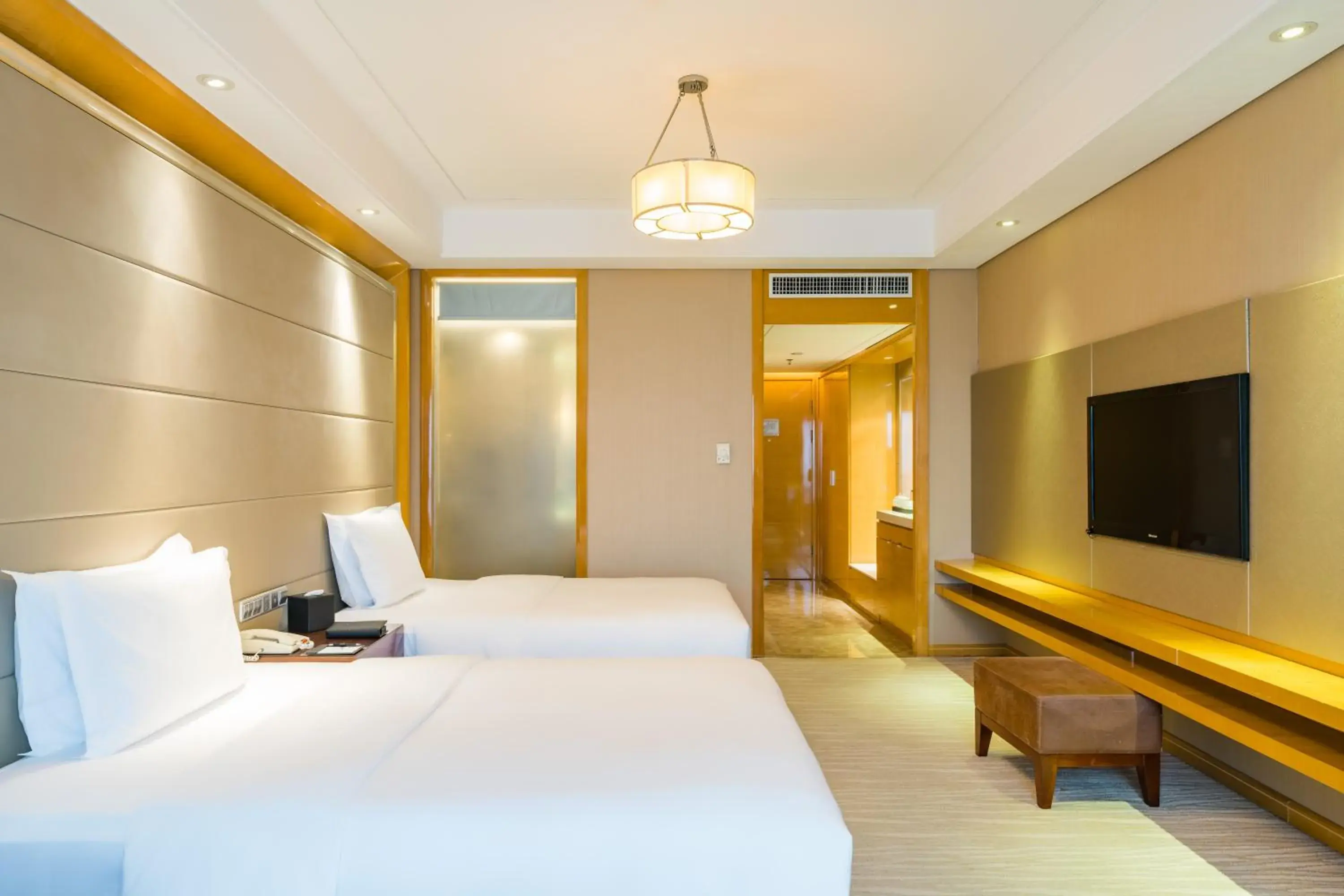 Bedroom in S&N Hotel Jiujiang Bedroom in S&N Hotel Jiujiang