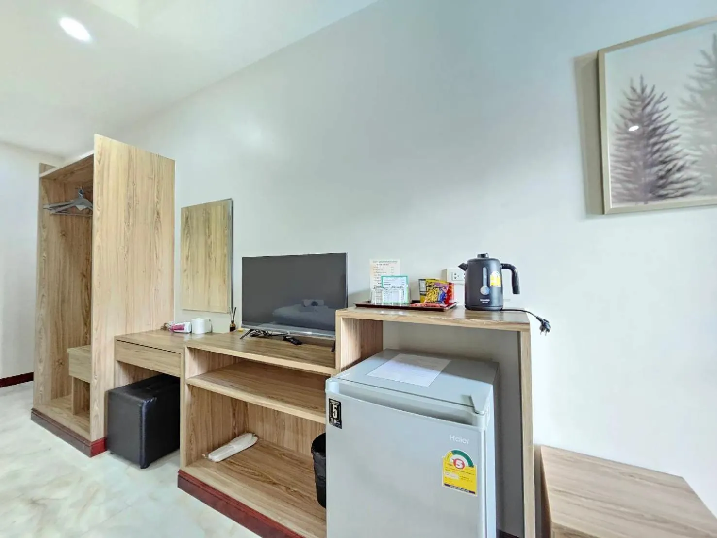 TV and multimedia in CottagePine Rayong Resort&Cafe