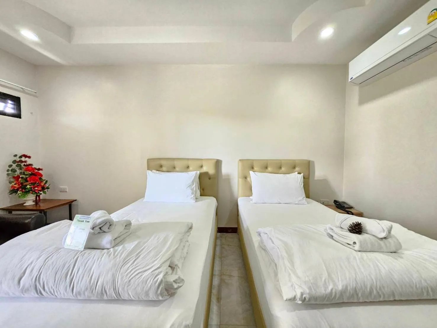 Bed in CottagePine Rayong Resort&Cafe
