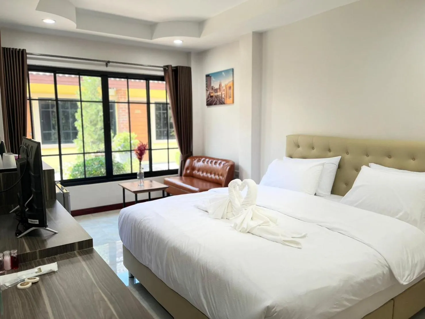 Bed in CottagePine Rayong Resort&Cafe