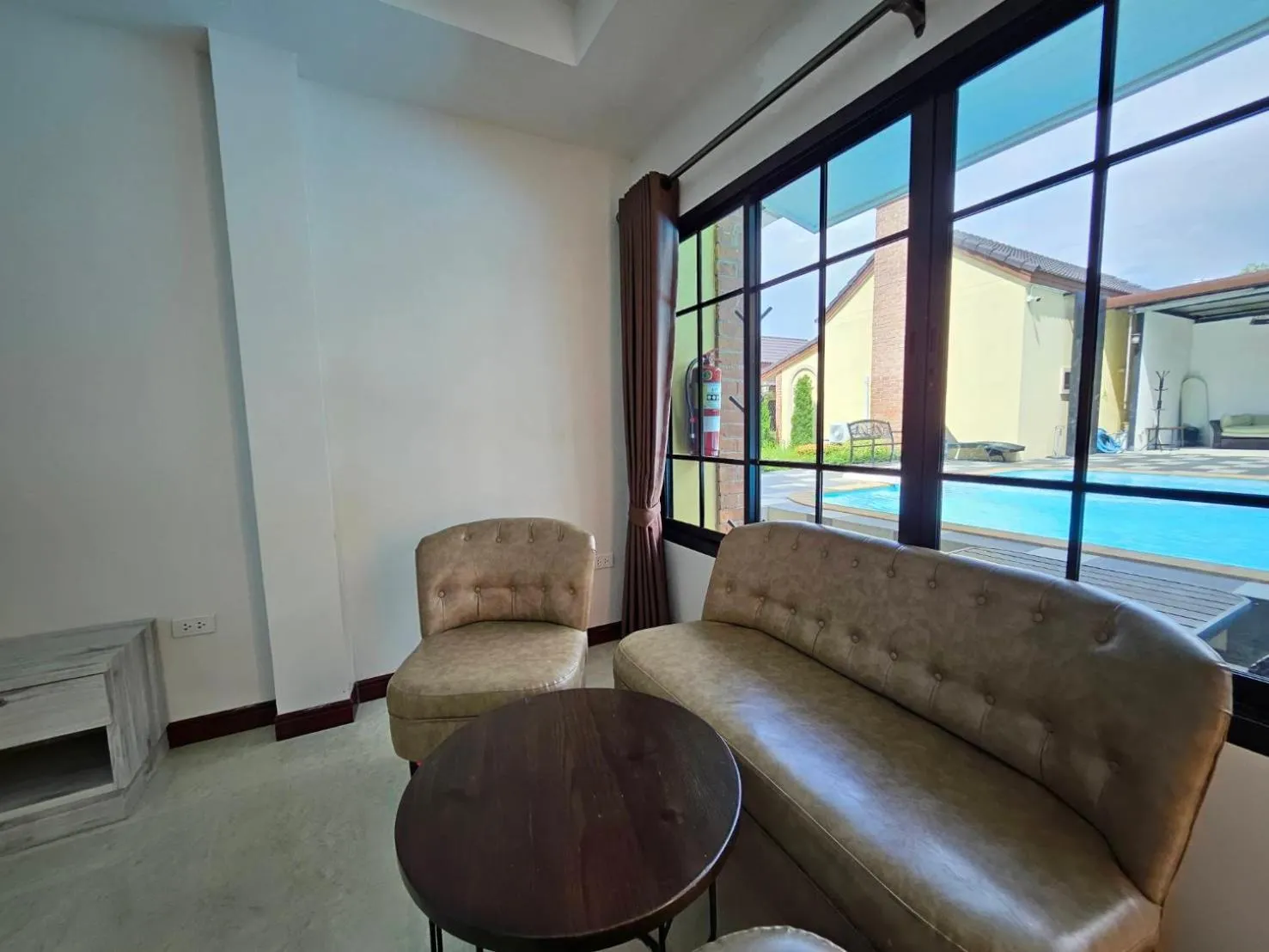 Seating area in CottagePine Rayong Resort&Cafe