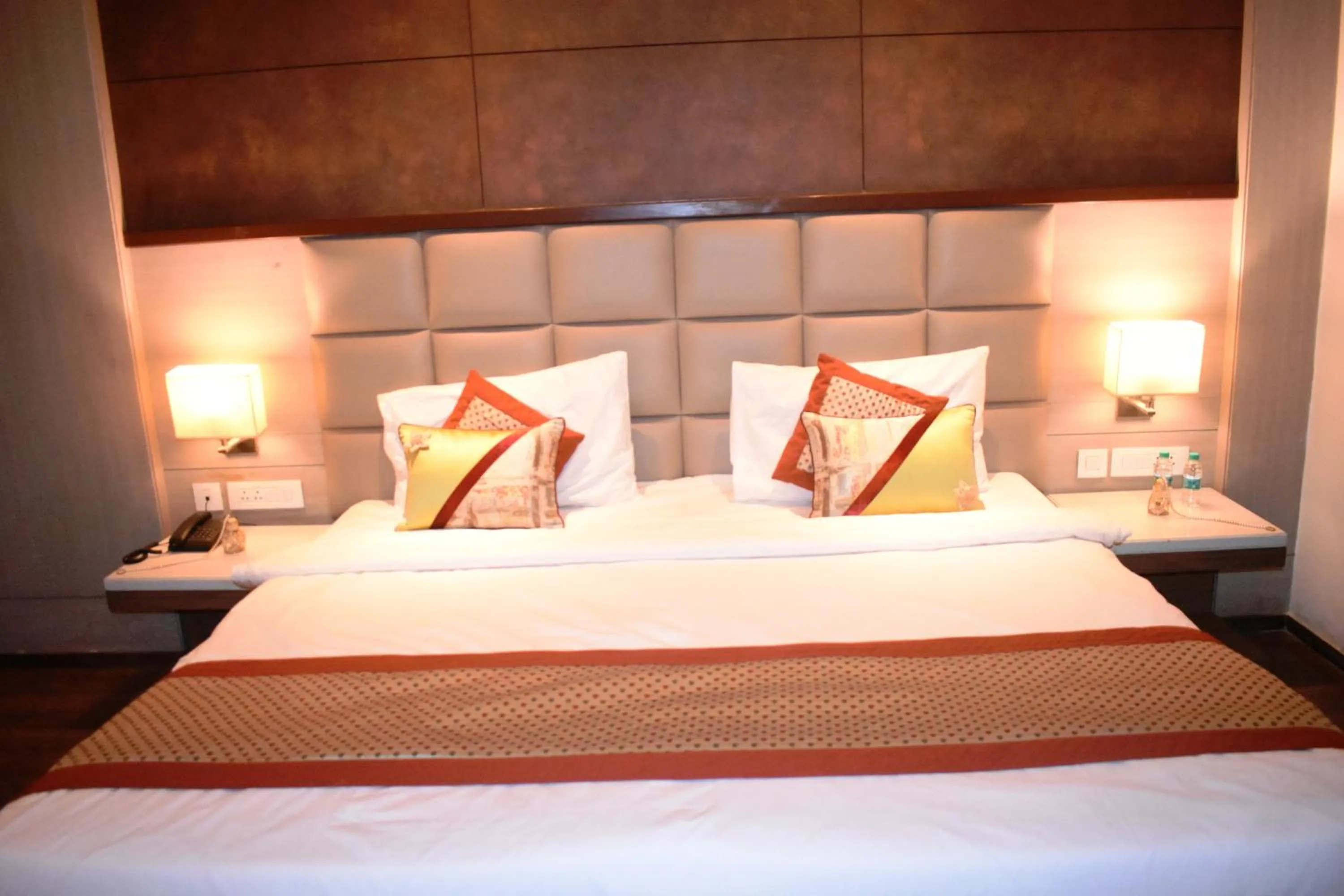 Bed in Lemonwood Suites by F9 Hotels - Trivoli Garden Chhatarpur