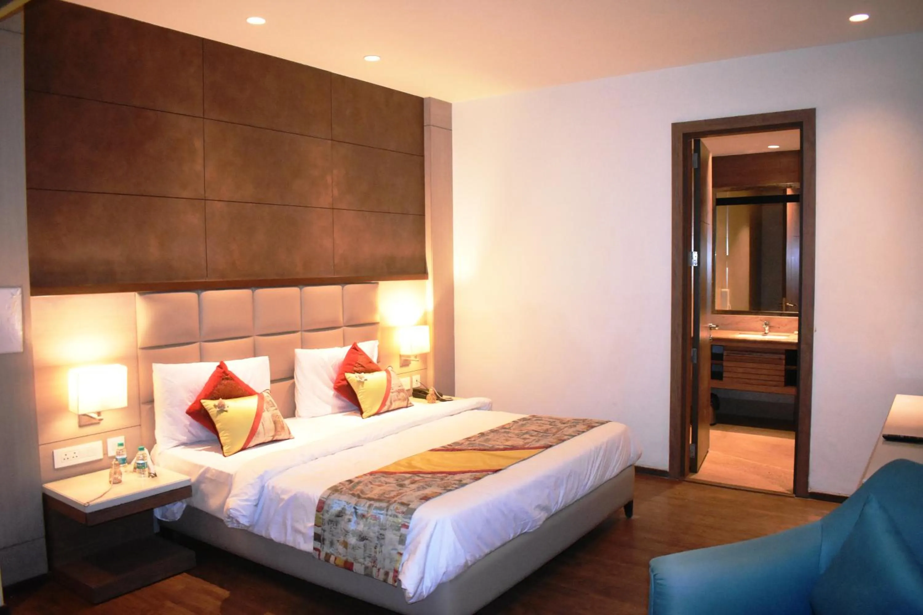Bedroom, Bed in Lemonwood Suites by F9 Hotels - Trivoli Garden Chhatarpur
