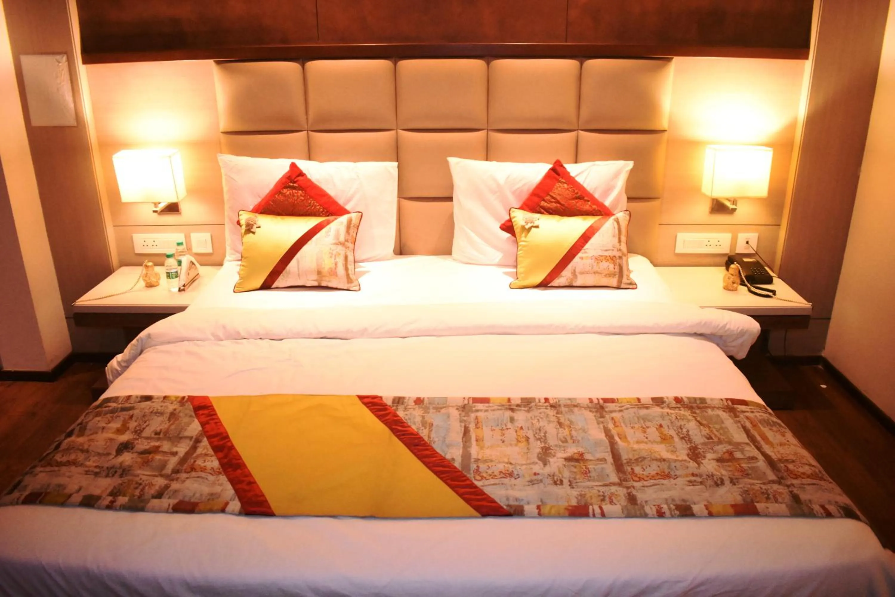 Photo of the whole room, Bed in Lemonwood Suites by F9 Hotels - Trivoli Garden Chhatarpur