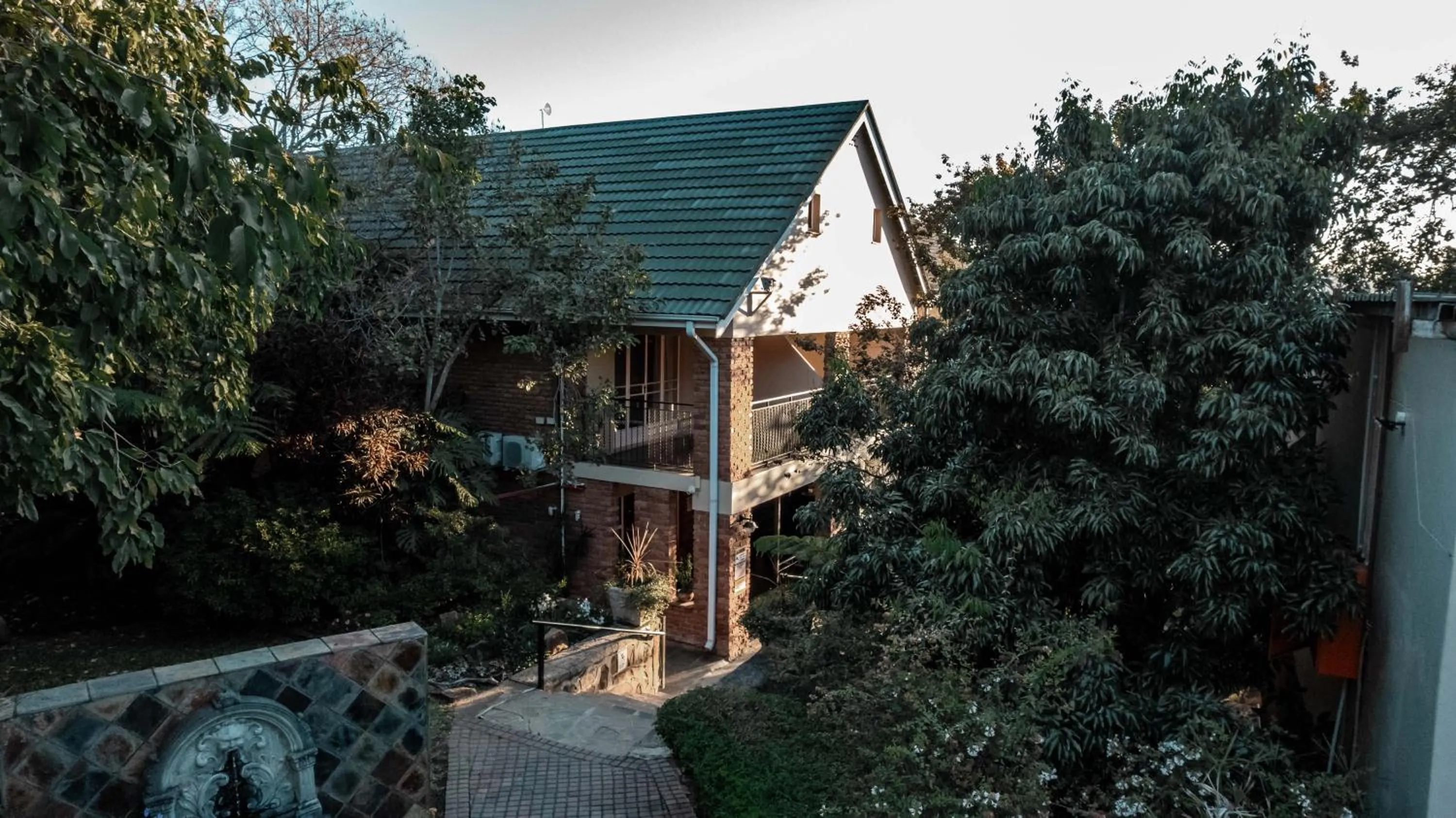 Property building in The Green Lizard Guesthouse