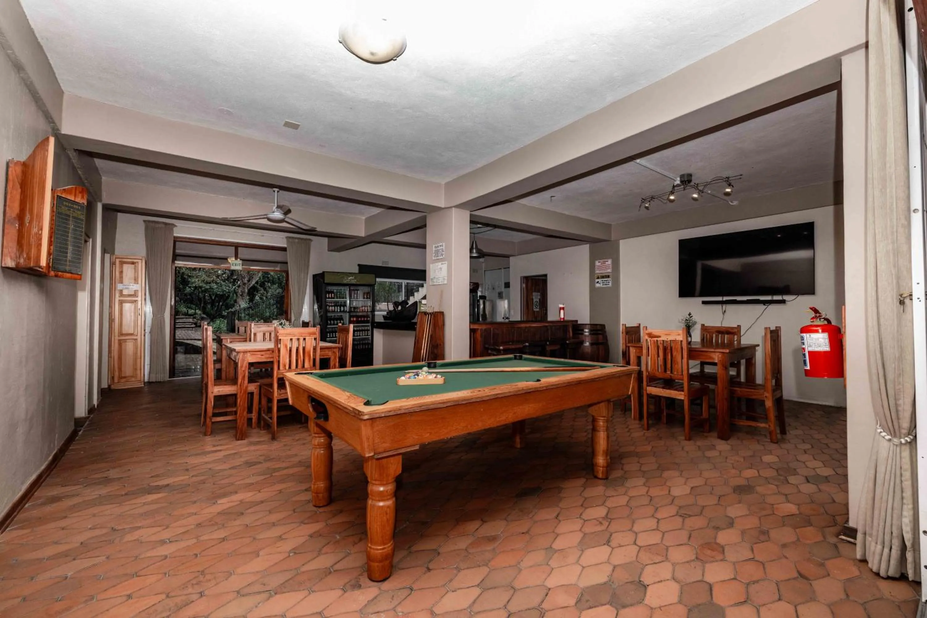 Communal lounge/ TV room in The Green Lizard Guesthouse