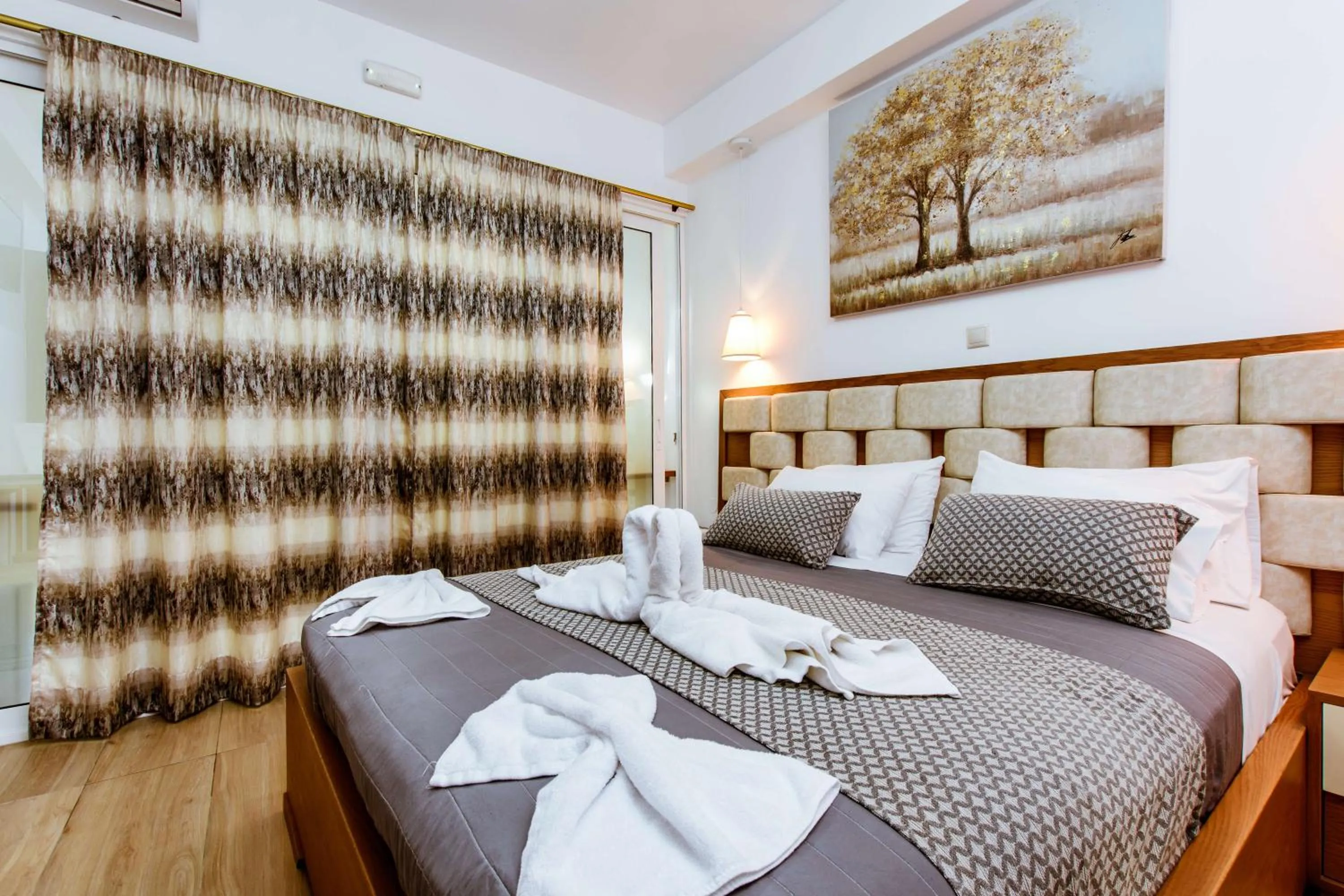 Bed in Bozzali Deluxe Hotel