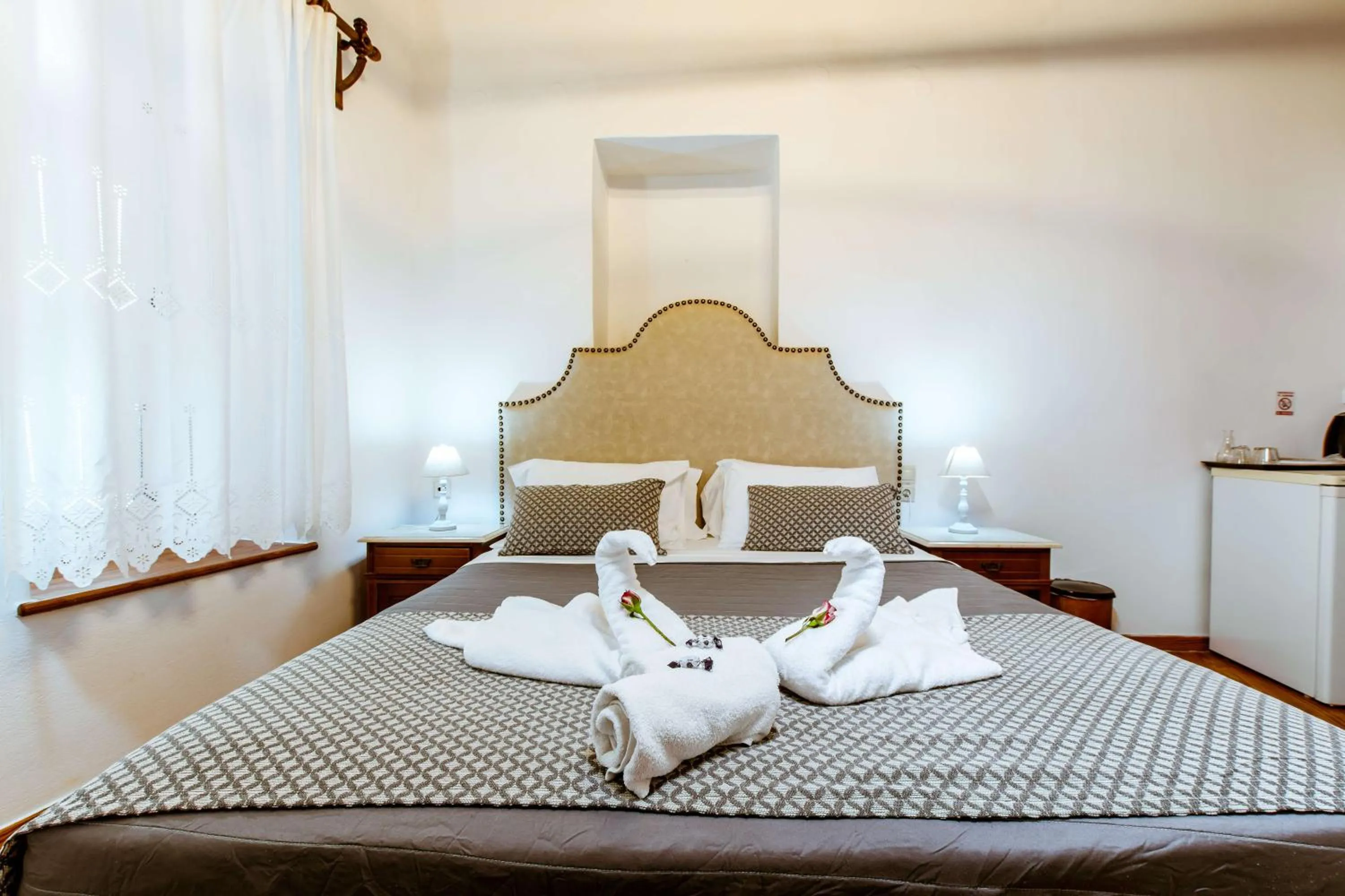 Bed in Bozzali Deluxe Hotel