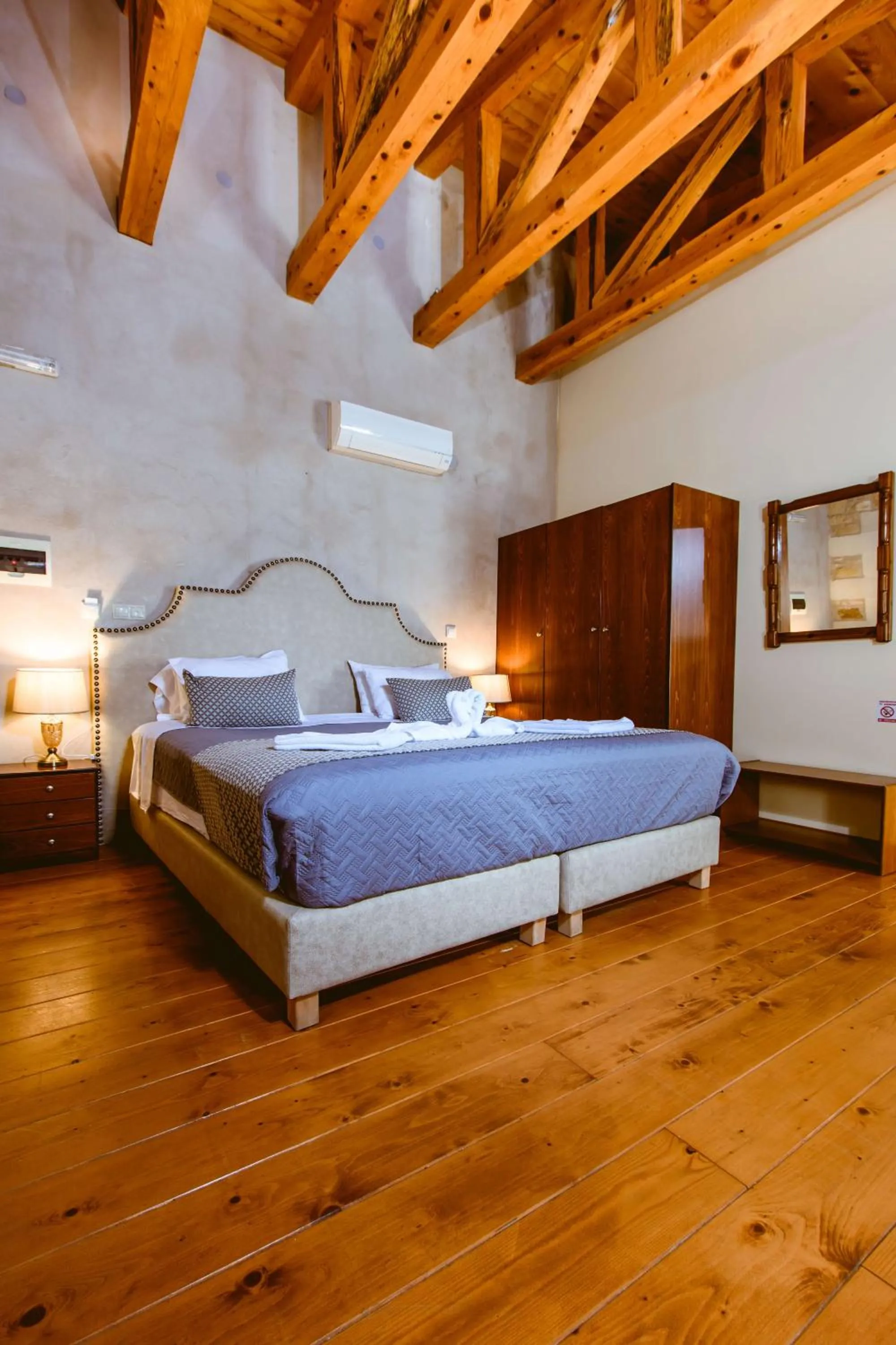 Bed in Bozzali Deluxe Hotel