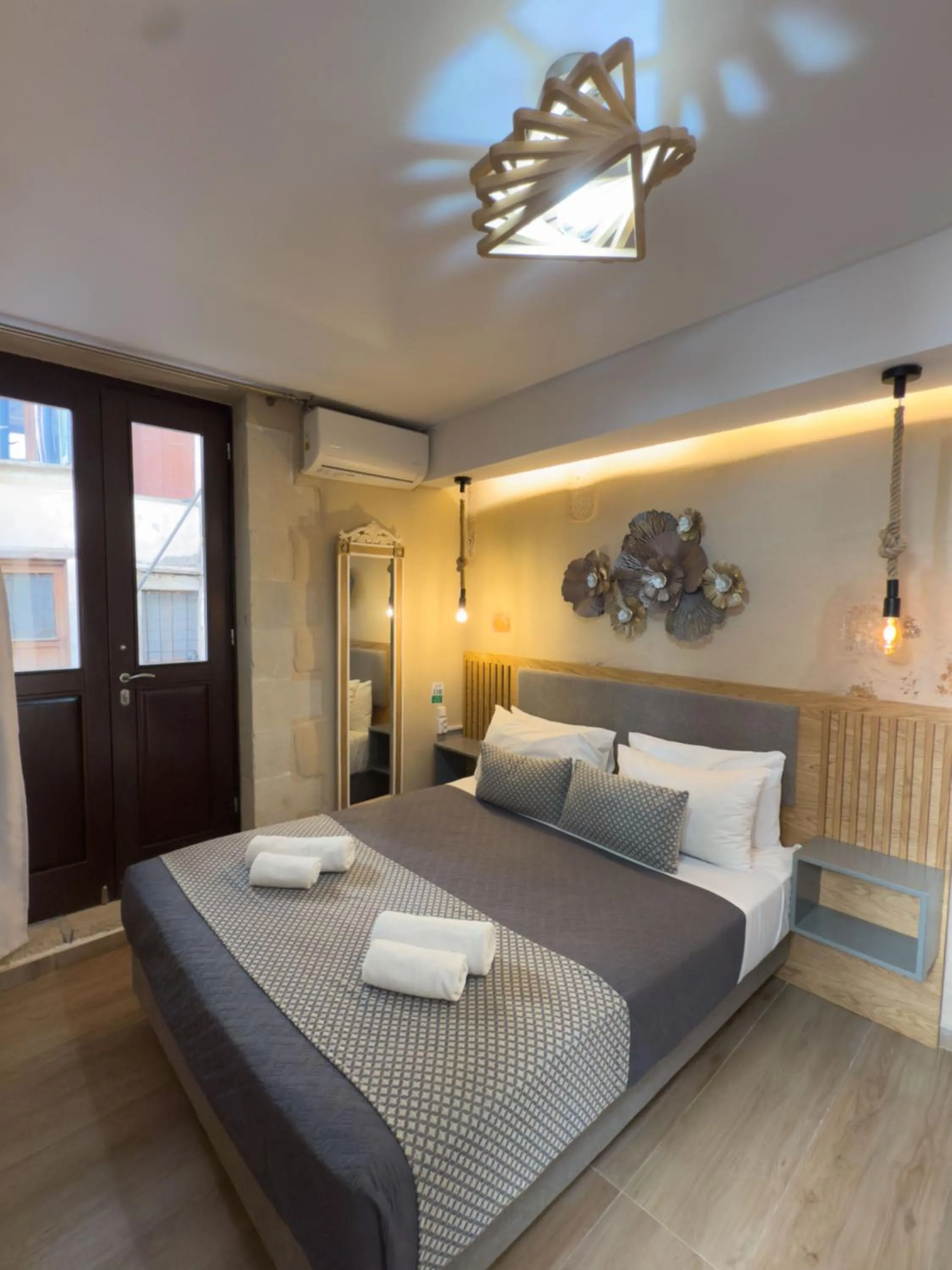 Bed in Bozzali Deluxe Hotel