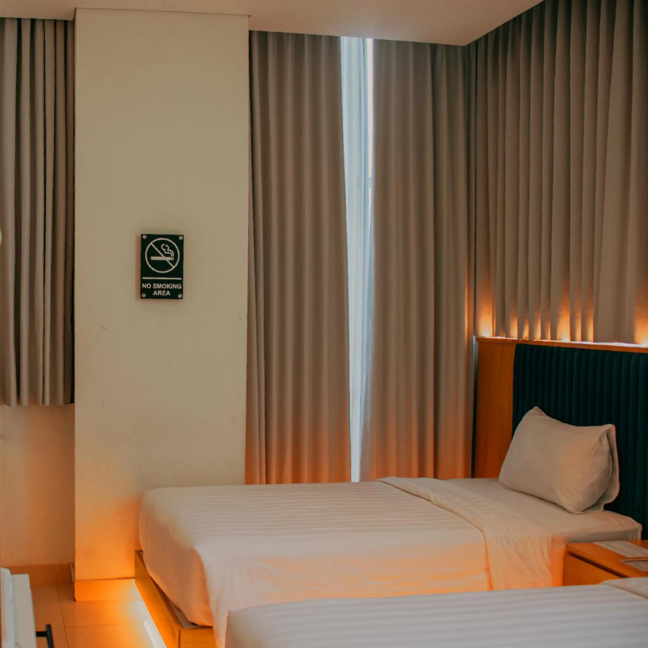 Bed in The Risman Hotel At Jakarta Airport CBC