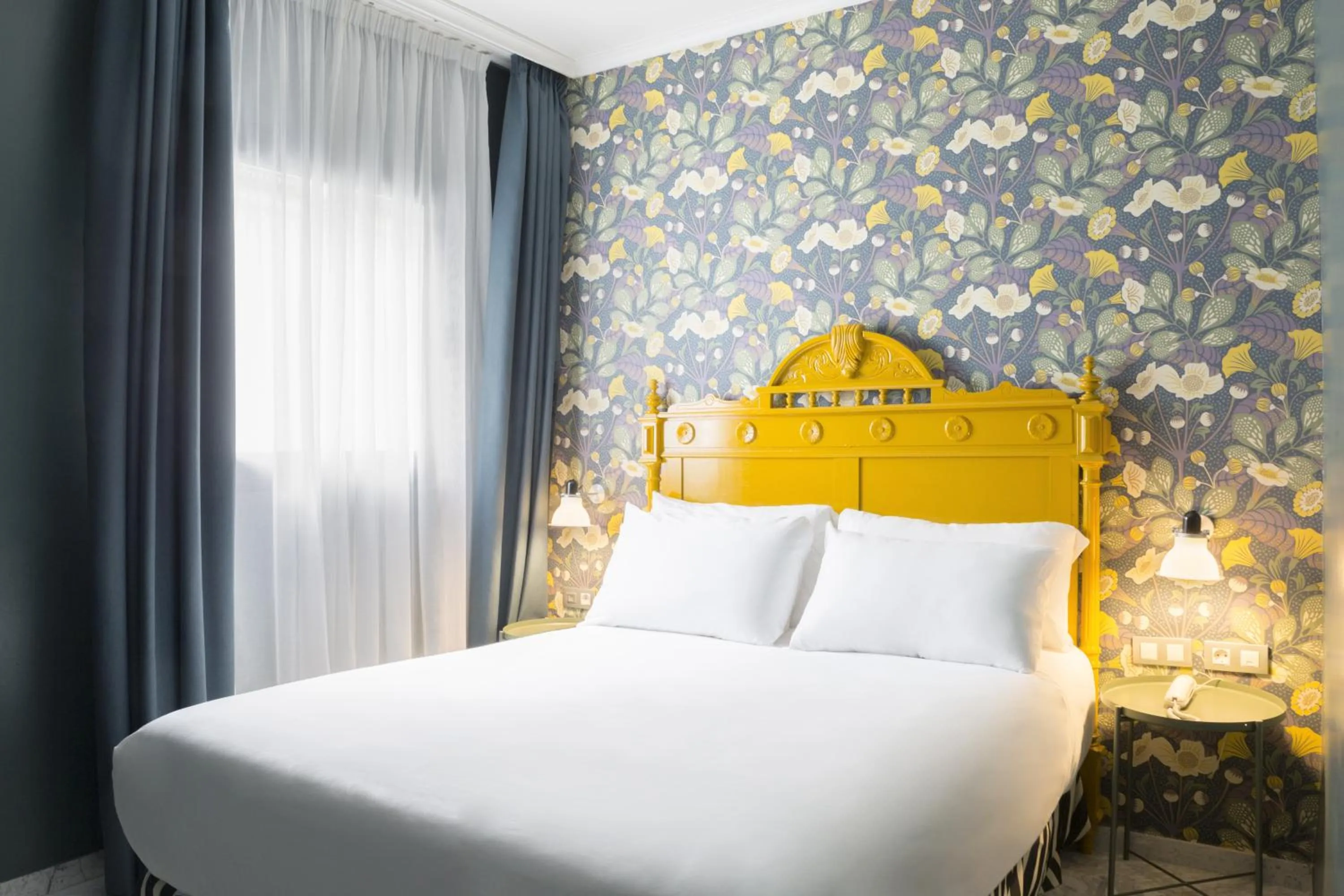 Bed in Petit Palace Puerta de Triana