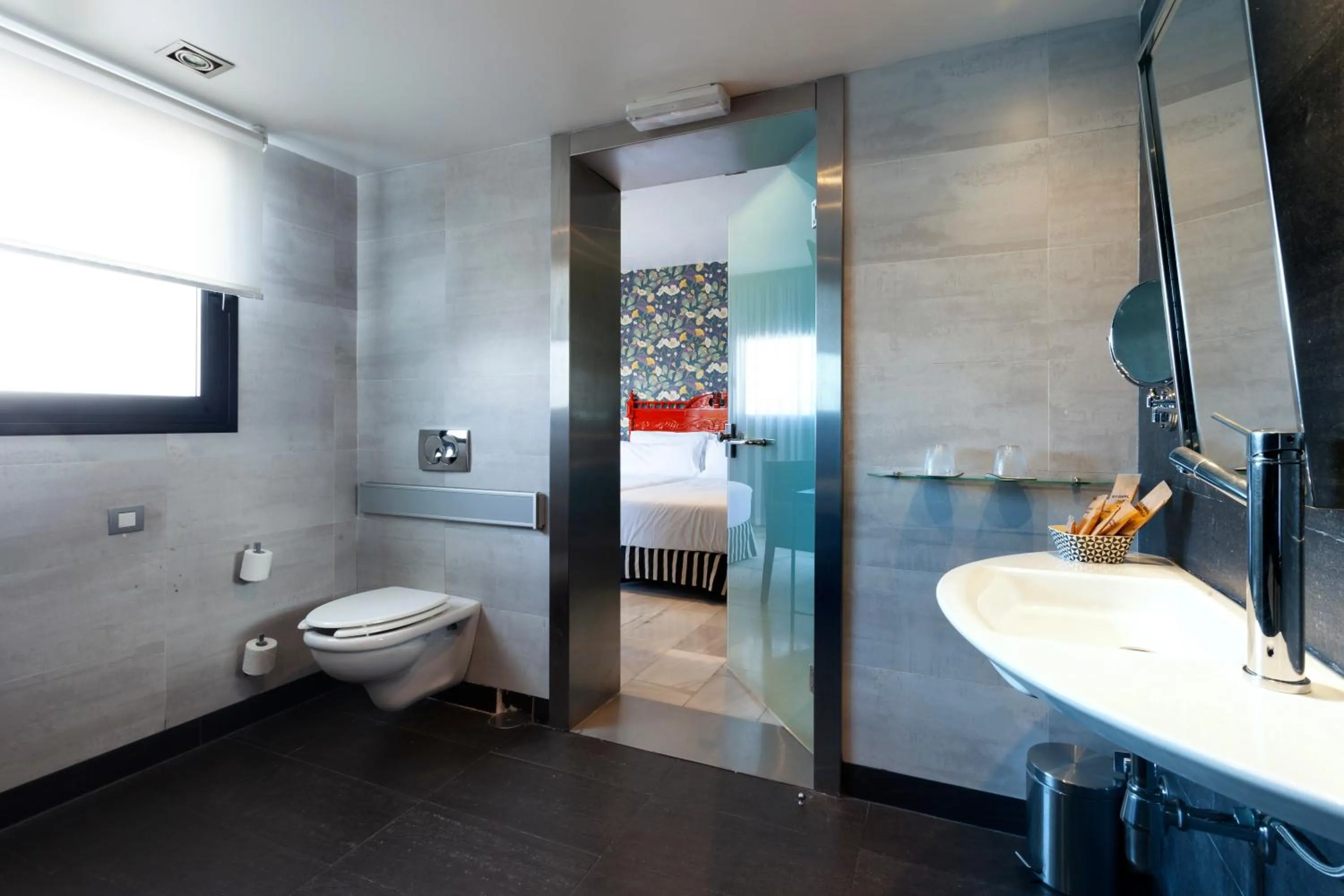 Bathroom in Petit Palace Puerta de Triana