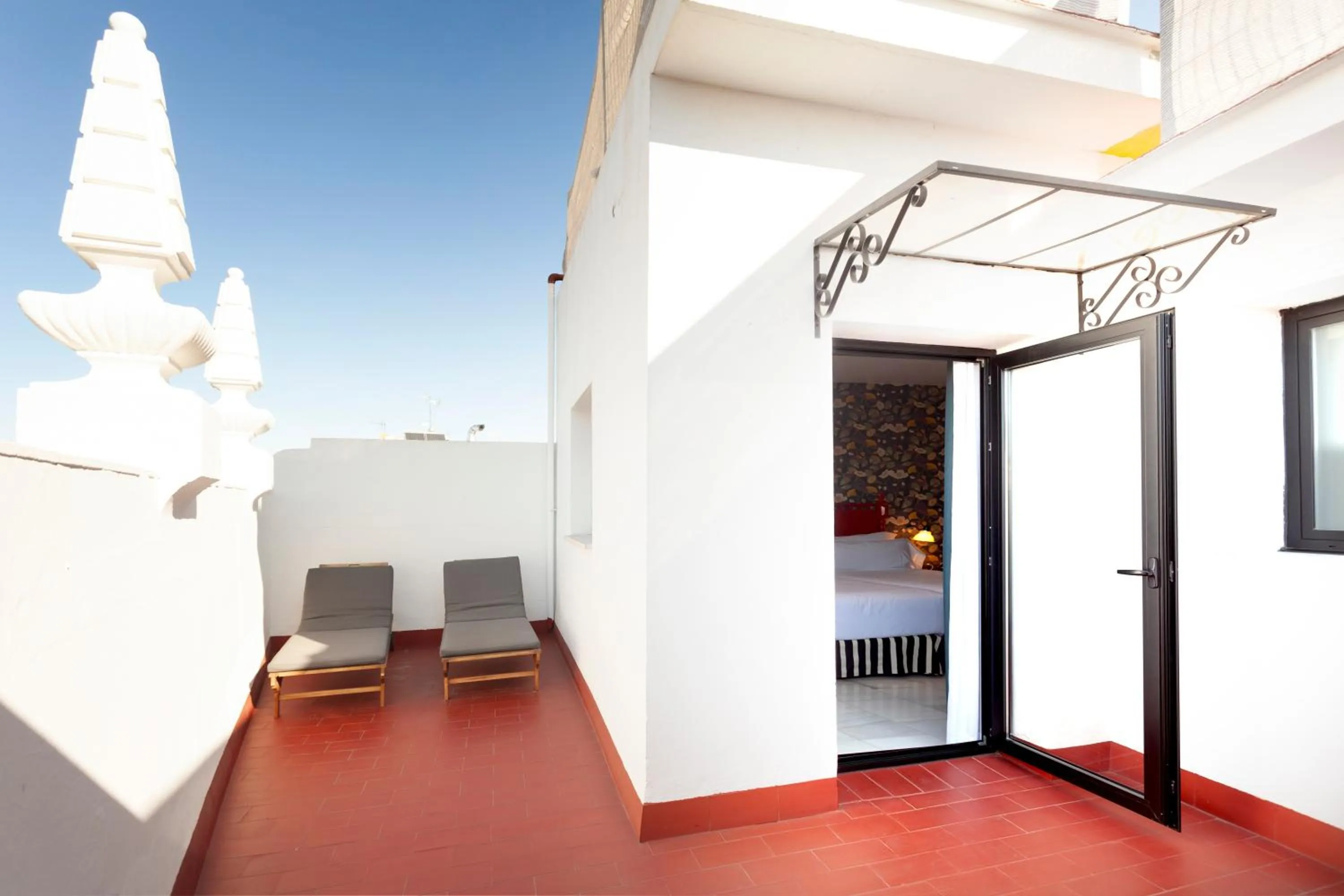 Balcony/Terrace, Bed in Petit Palace Puerta de Triana
