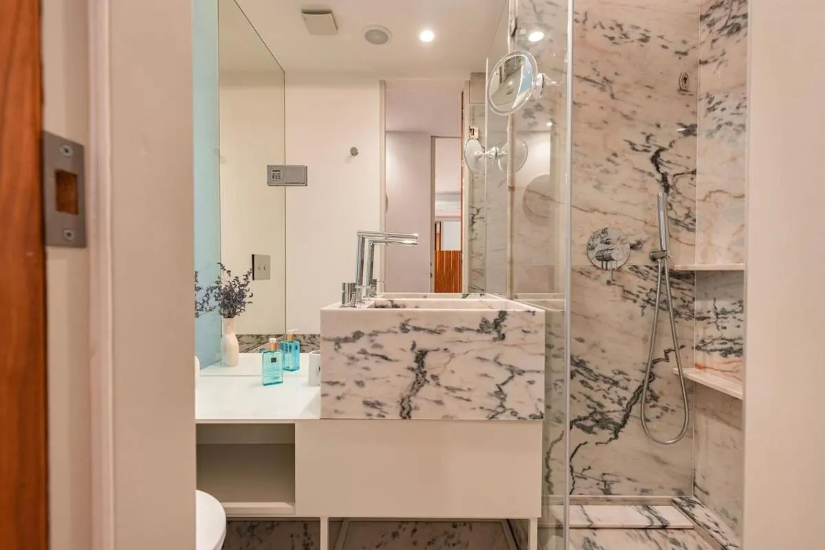 Shower in Condessa I by Innkeeper