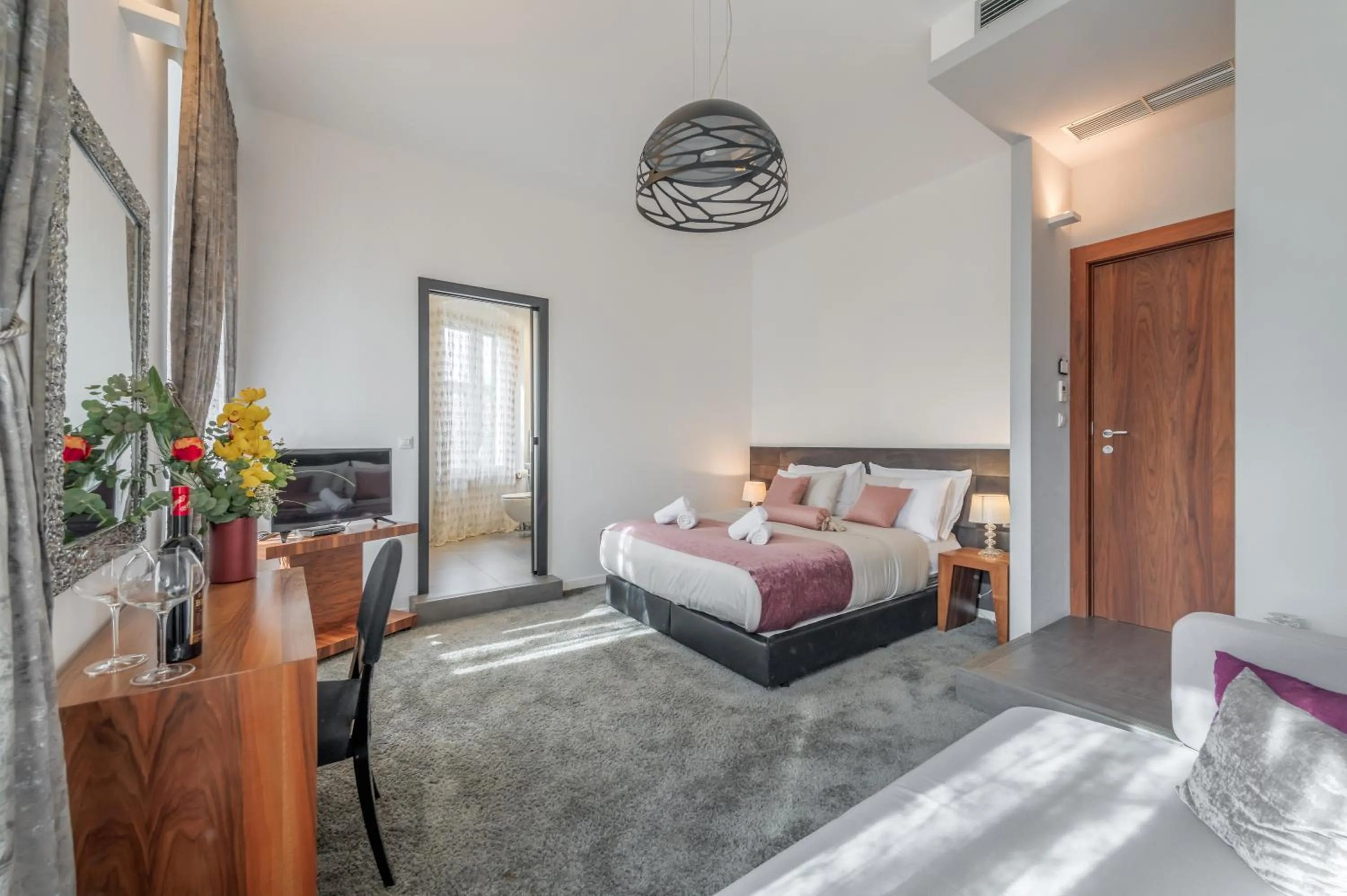 Bed in Starlight Luxury Suites