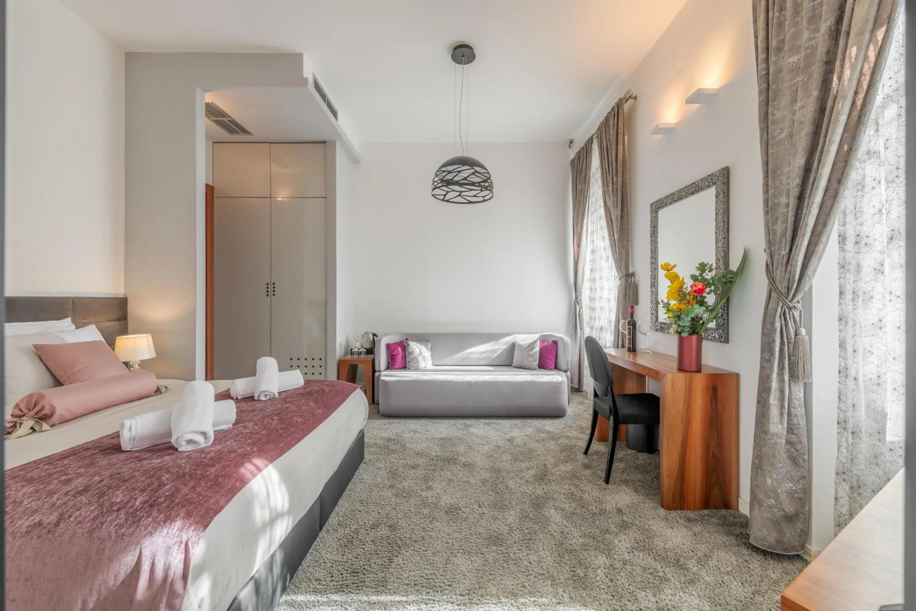 Bed in Starlight Luxury Suites