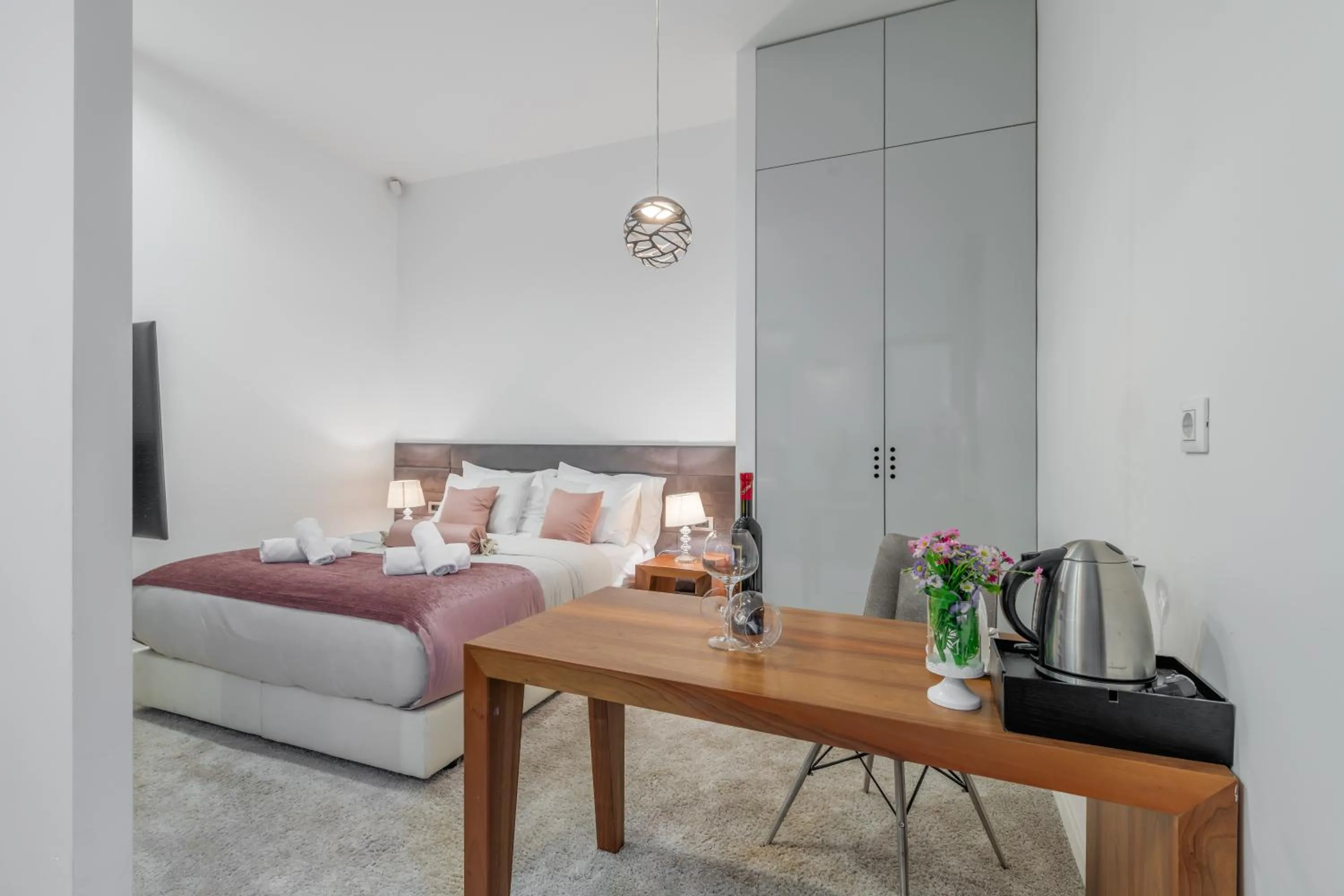 Bed in Starlight Luxury Suites