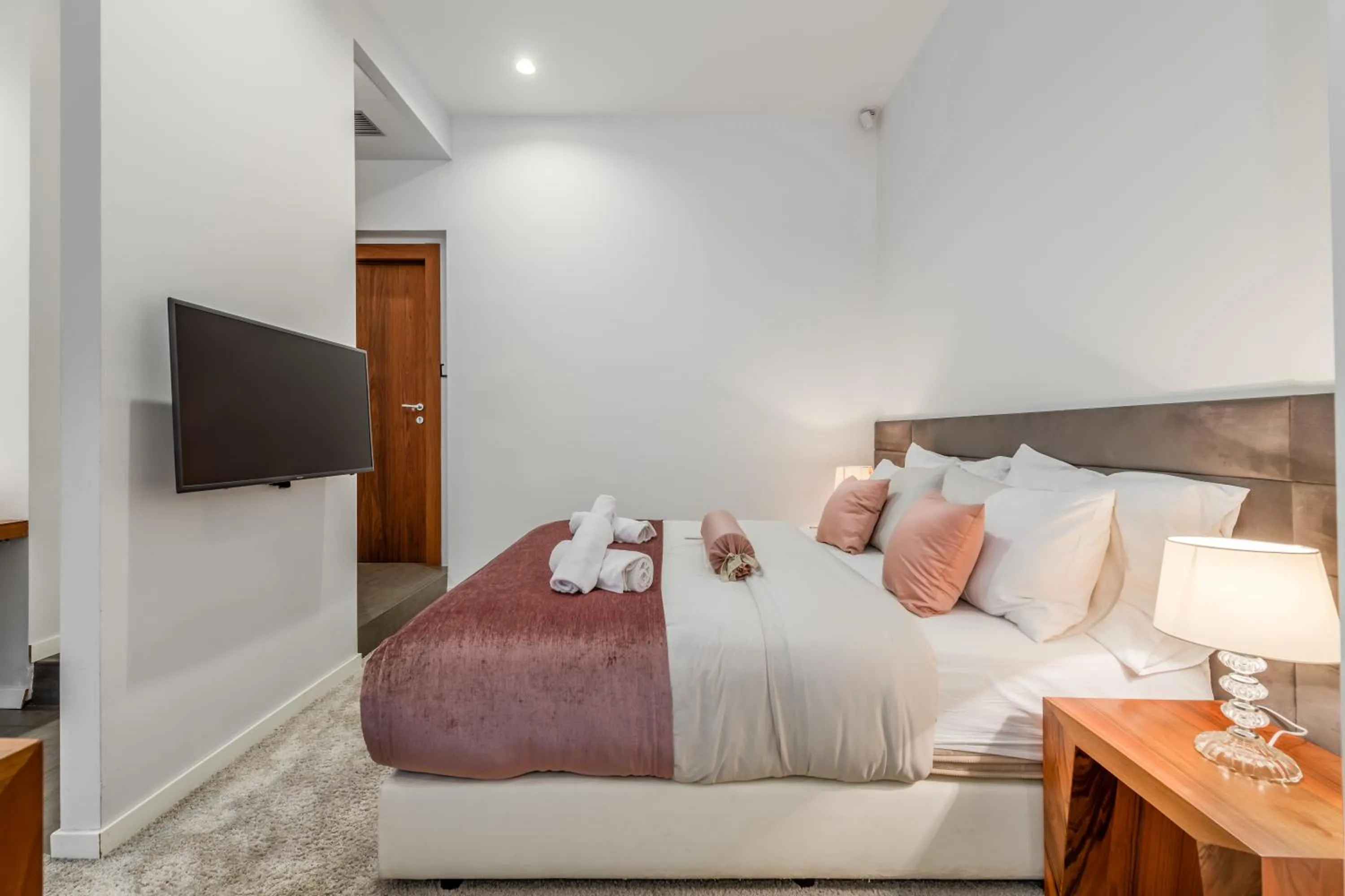 Bed in Starlight Luxury Suites