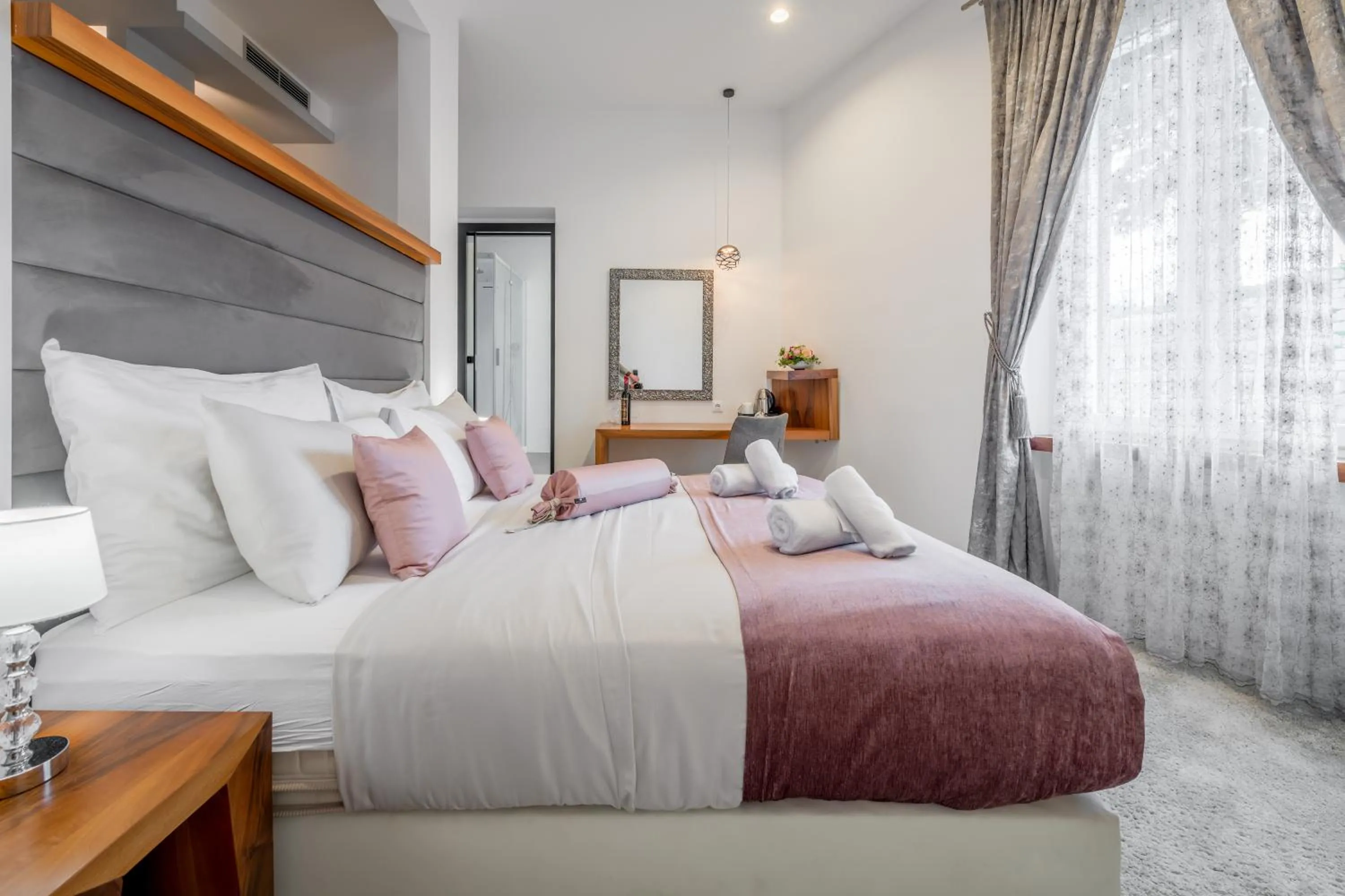 Bed in Starlight Luxury Suites