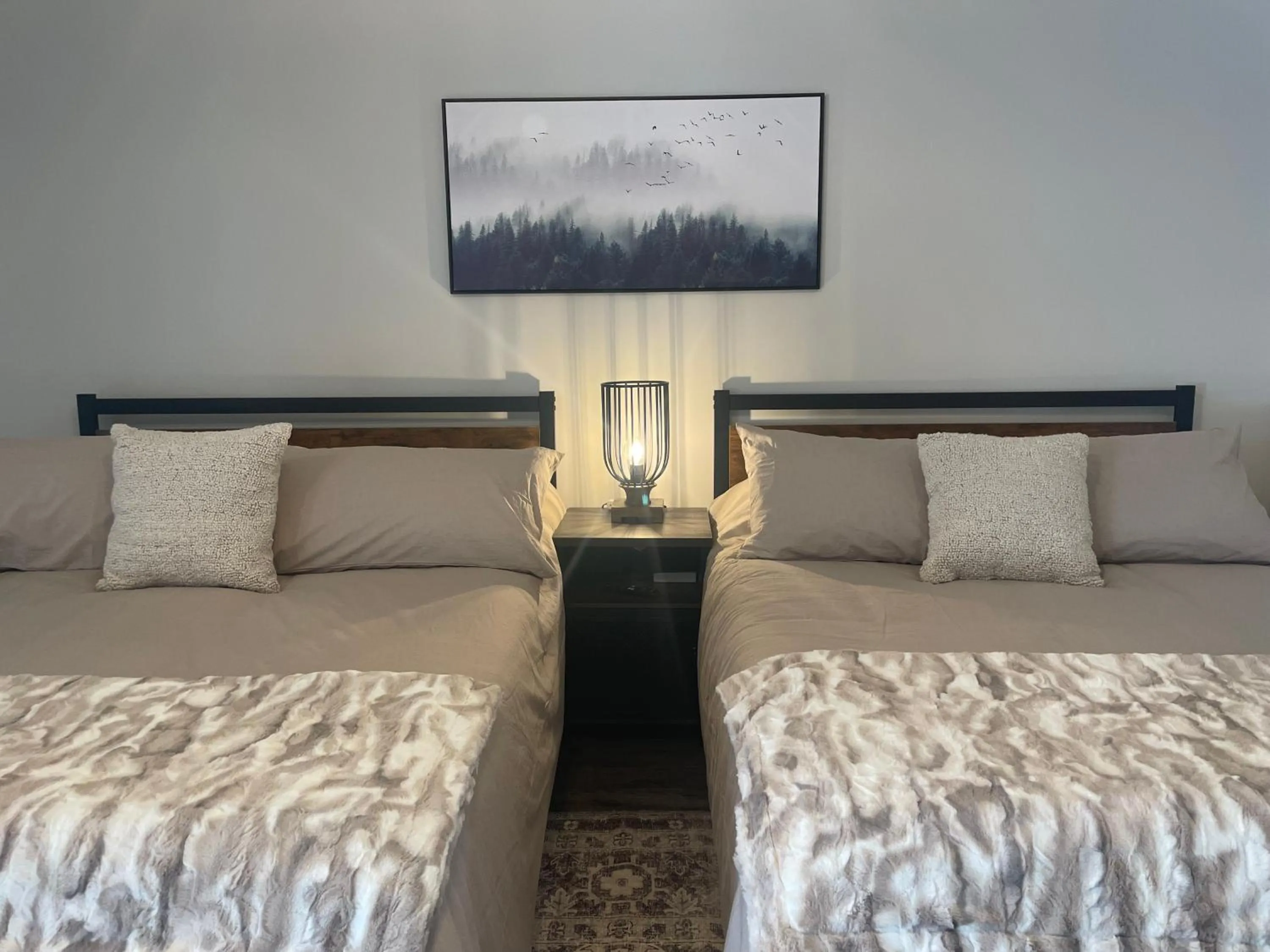 Bed in Alaska Lake + Lodge at Longmere