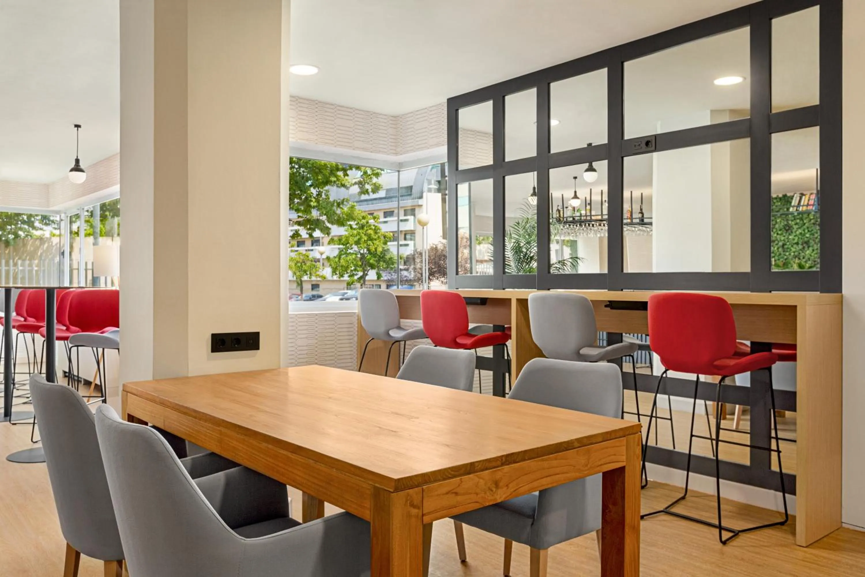 Living room in Ramada by Wyndham Madrid Tres Cantos