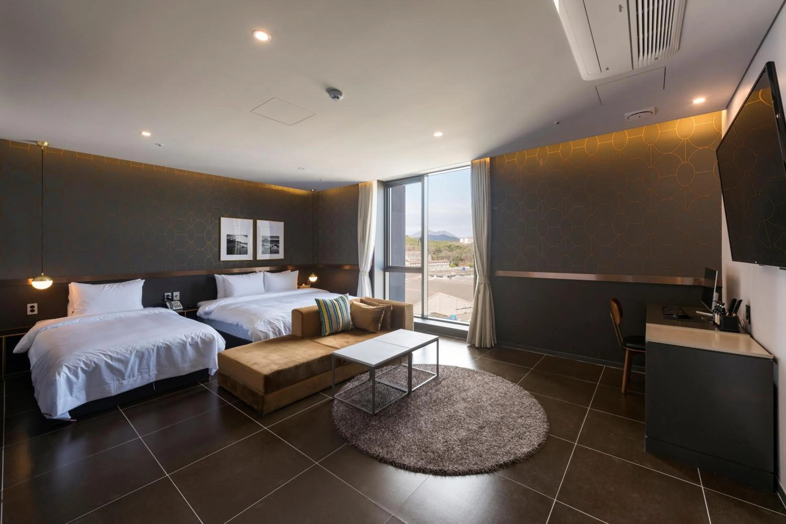 Bed in Browndot hotel Guseo