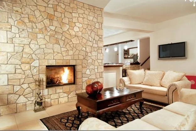 Communal lounge/ TV room in Vytina Mountain View Hotel