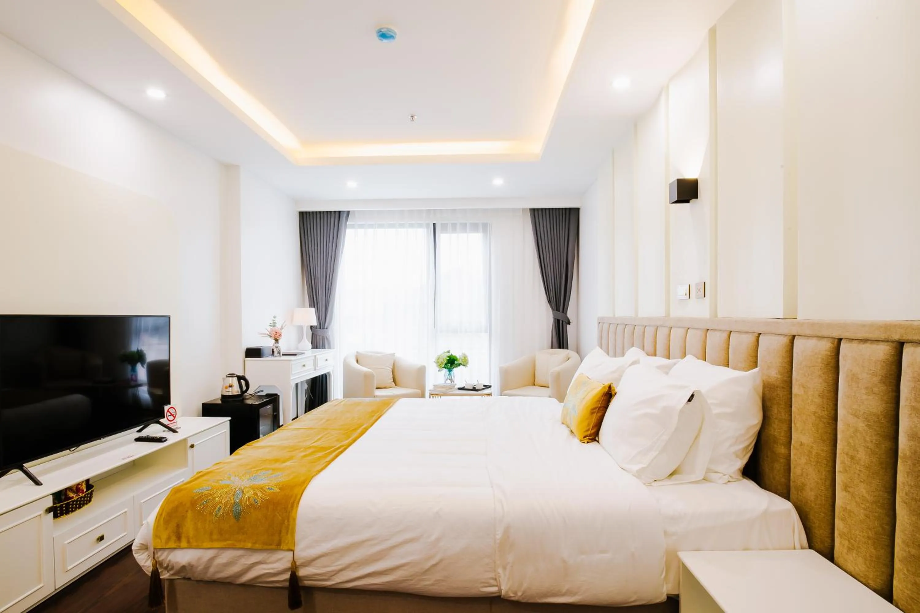 Bed in Royal Lotus Hotel