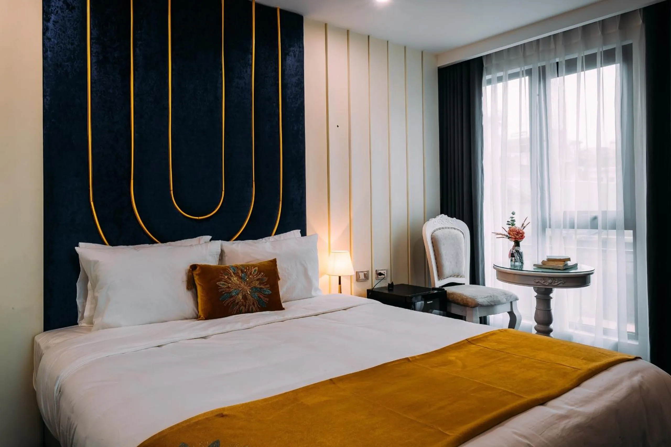 Bed in Royal Lotus Hotel