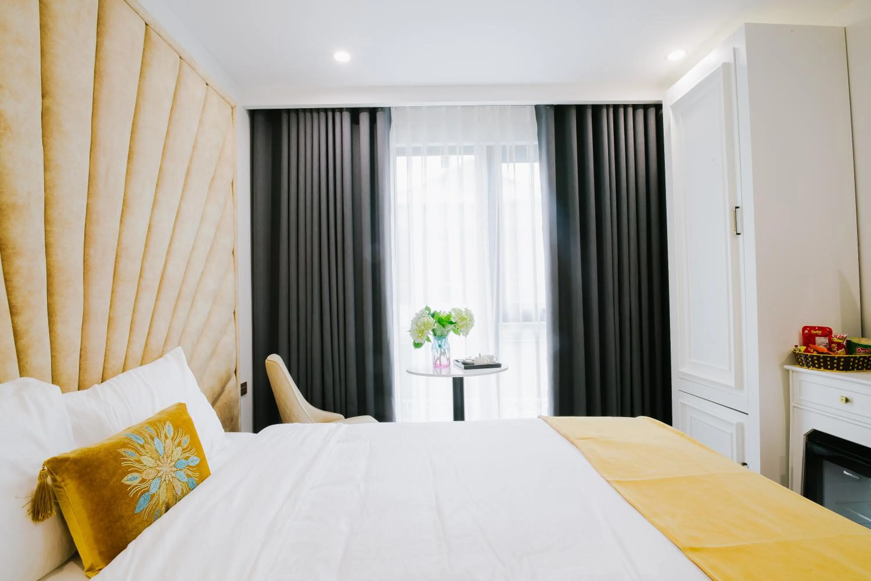 Bed in Royal Lotus Hotel