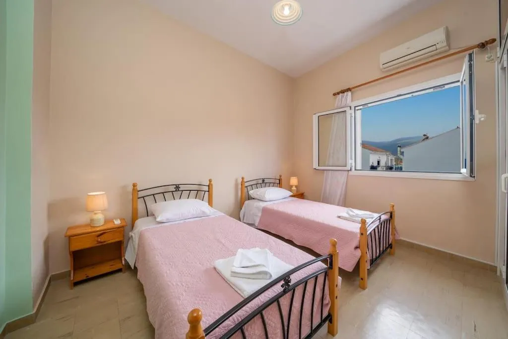 Bed in Vasilakis Apartment