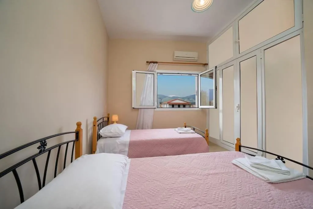 Bed in Vasilakis Apartment