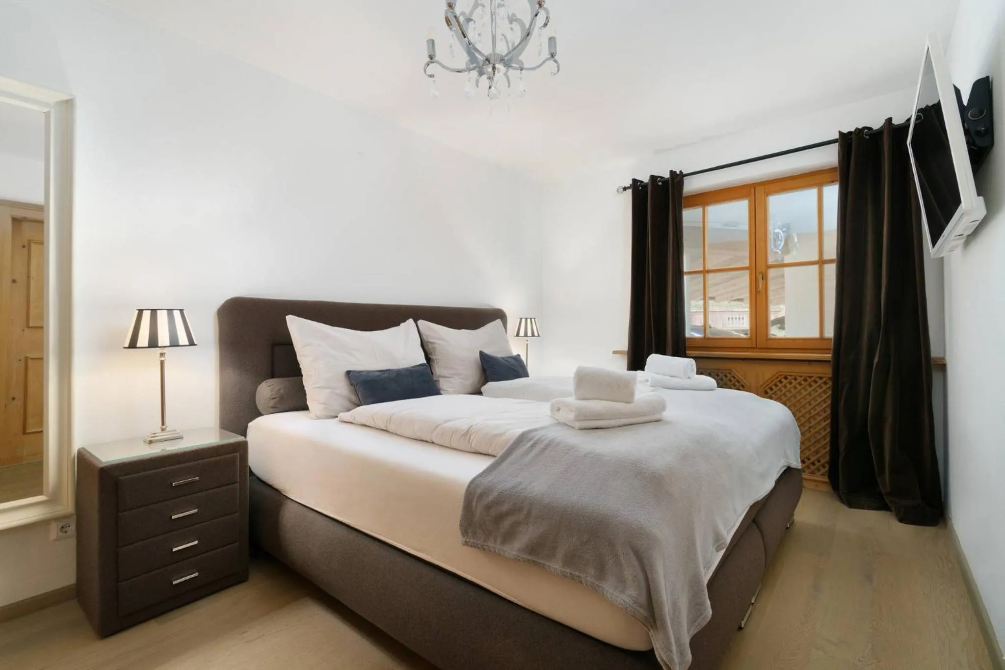 Bed in Kitz-Heart Apartments by Alpine Host Helpers