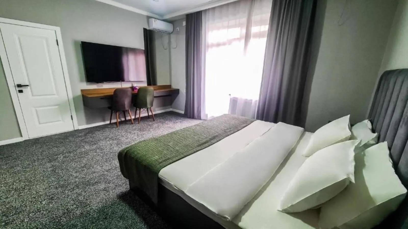 Property building, Bed in Dosman Hotel Bishkek